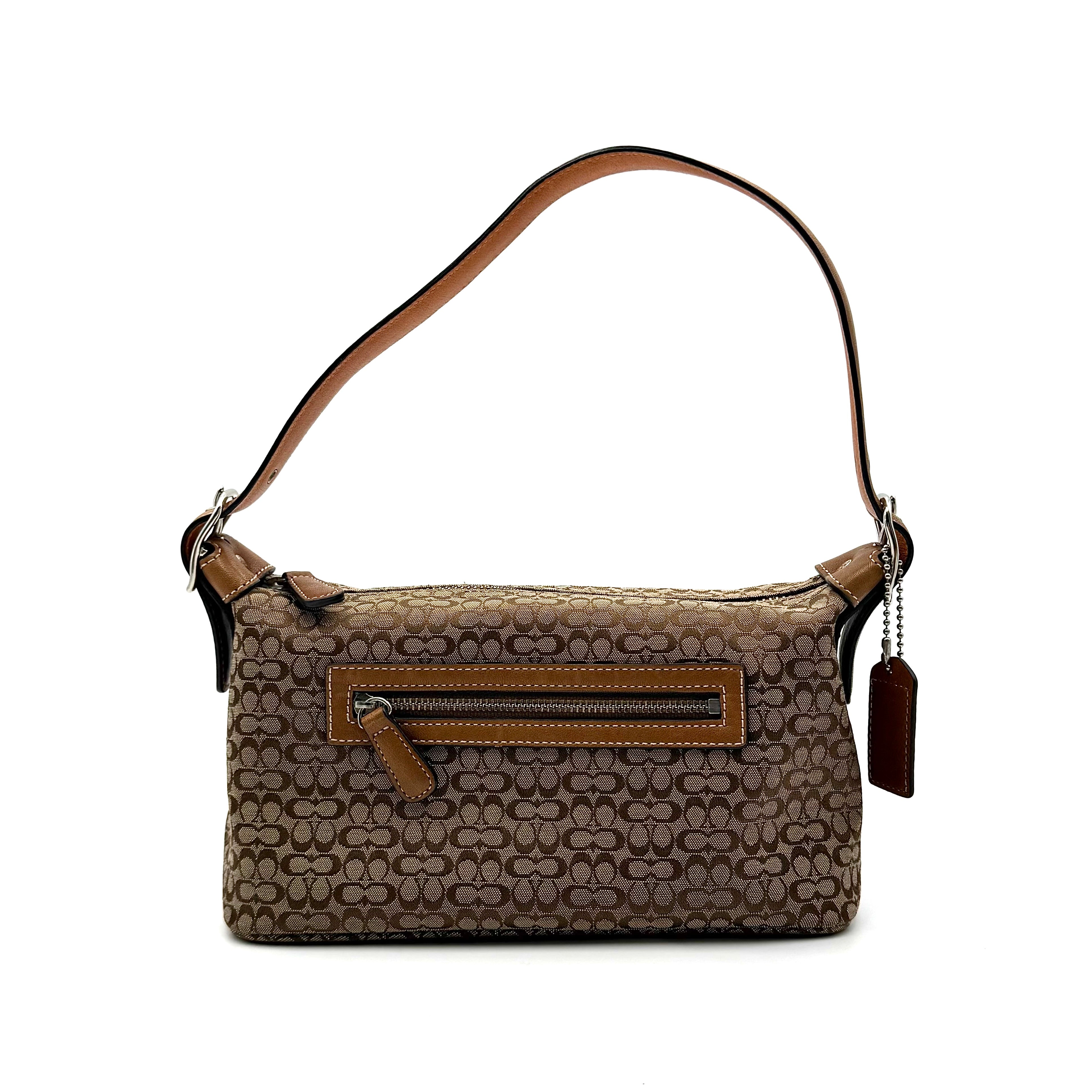 Coach signature beige jacquard hobo shoulder bag with tan leather trim and silver-tone hardware.