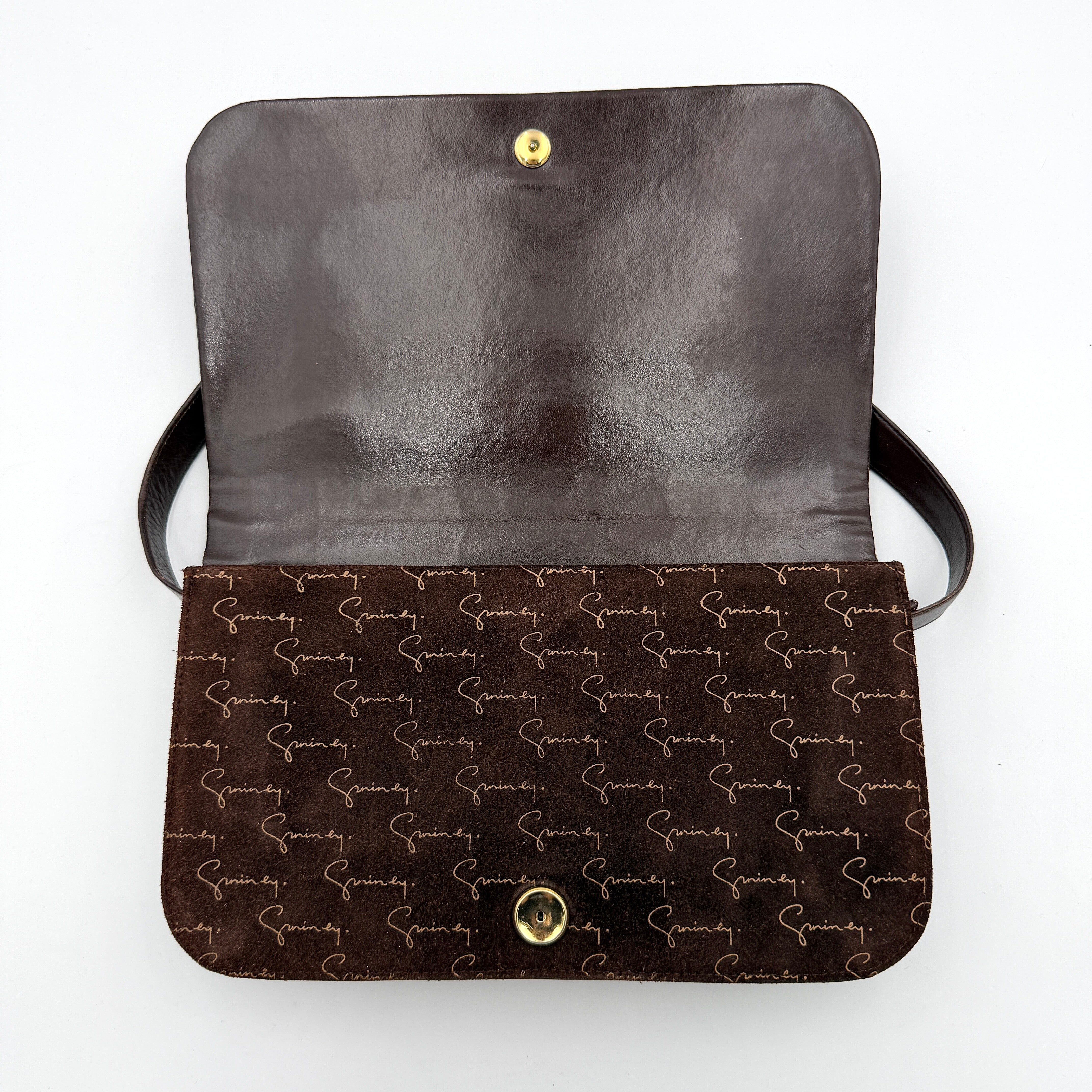 Givenchy 4G Monogram brown suede shoulder bag with leather trim and silver-tone clasp, photographed on a white background.