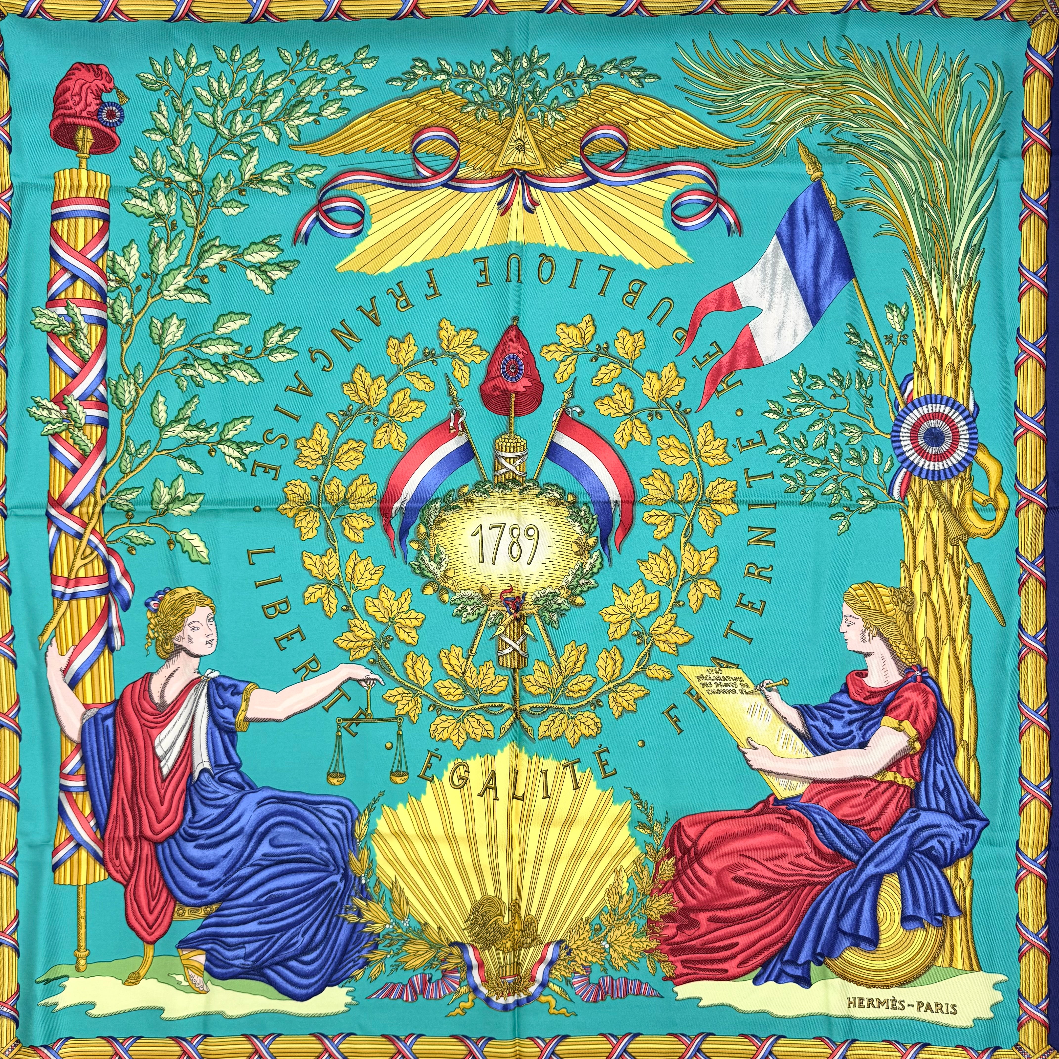 Hermès Liberté Égalité Fraternité silk scarf in vibrant blue with classical French motifs and tricolour accents.