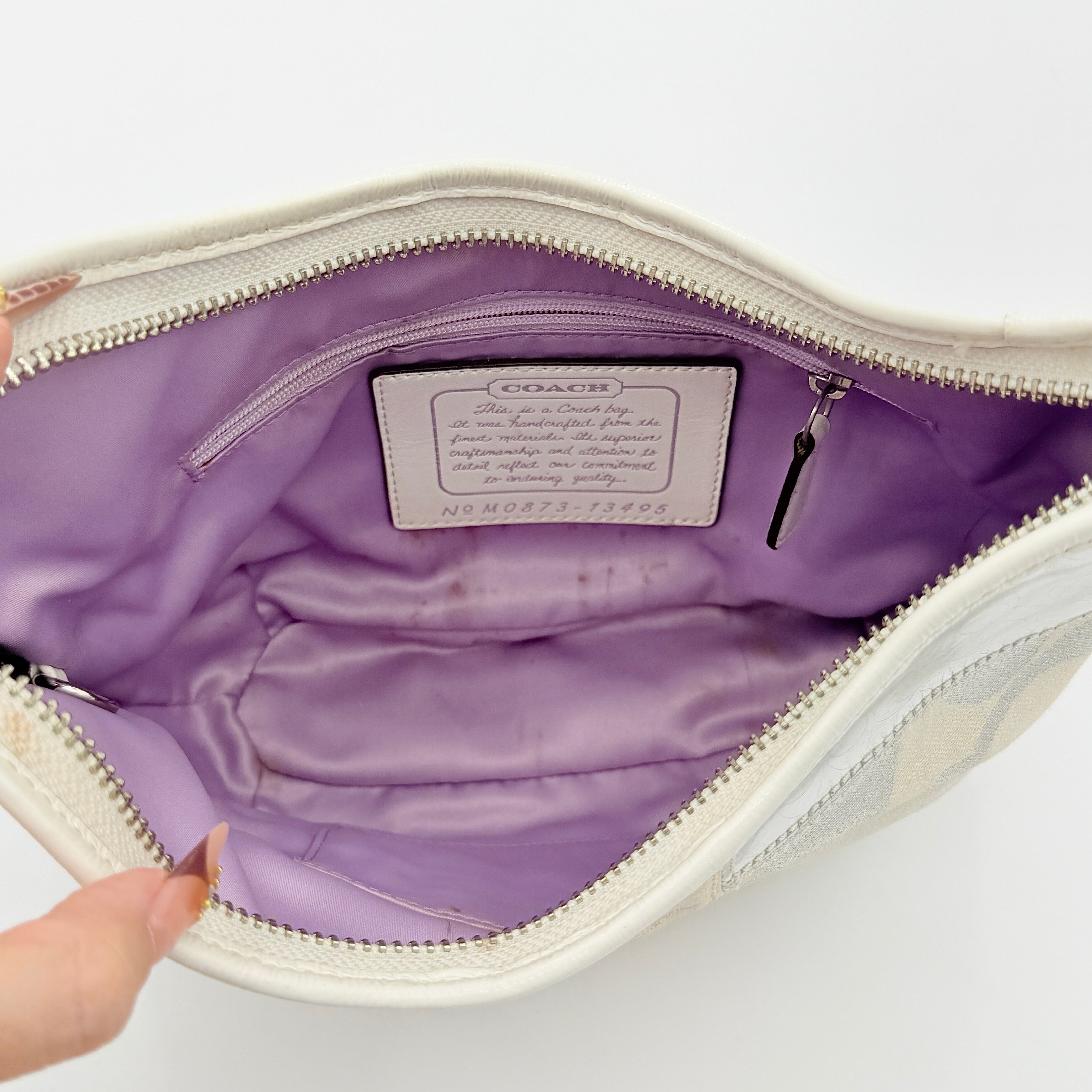 Coach Y2K Signature Patchwork Hobo Shoulder Bag in cream and silver jacquard with wide leather handle, shown on a white background.