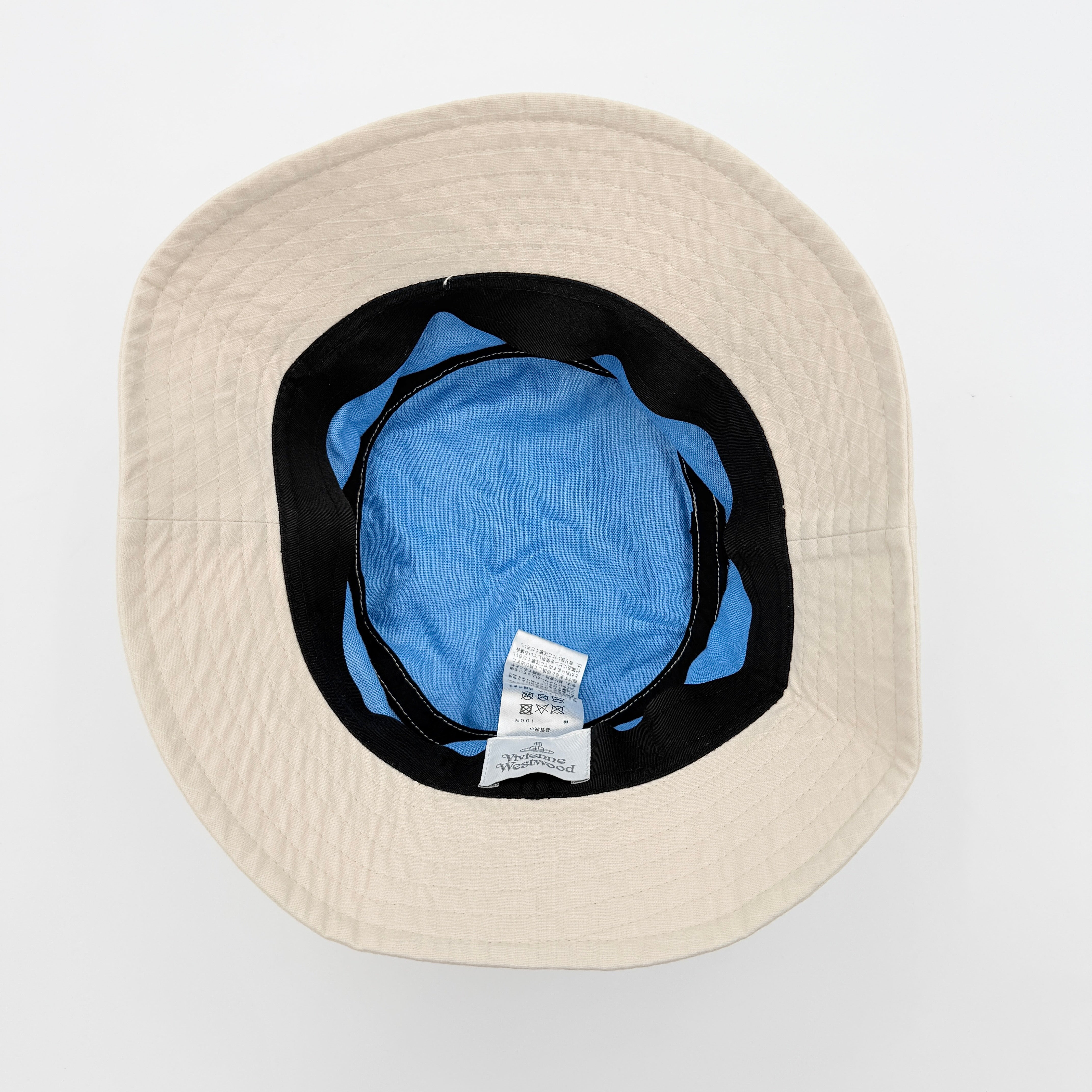 Vivienne Westwood Orb London bucket hat in cream cotton with black embroidery, shown from the front.