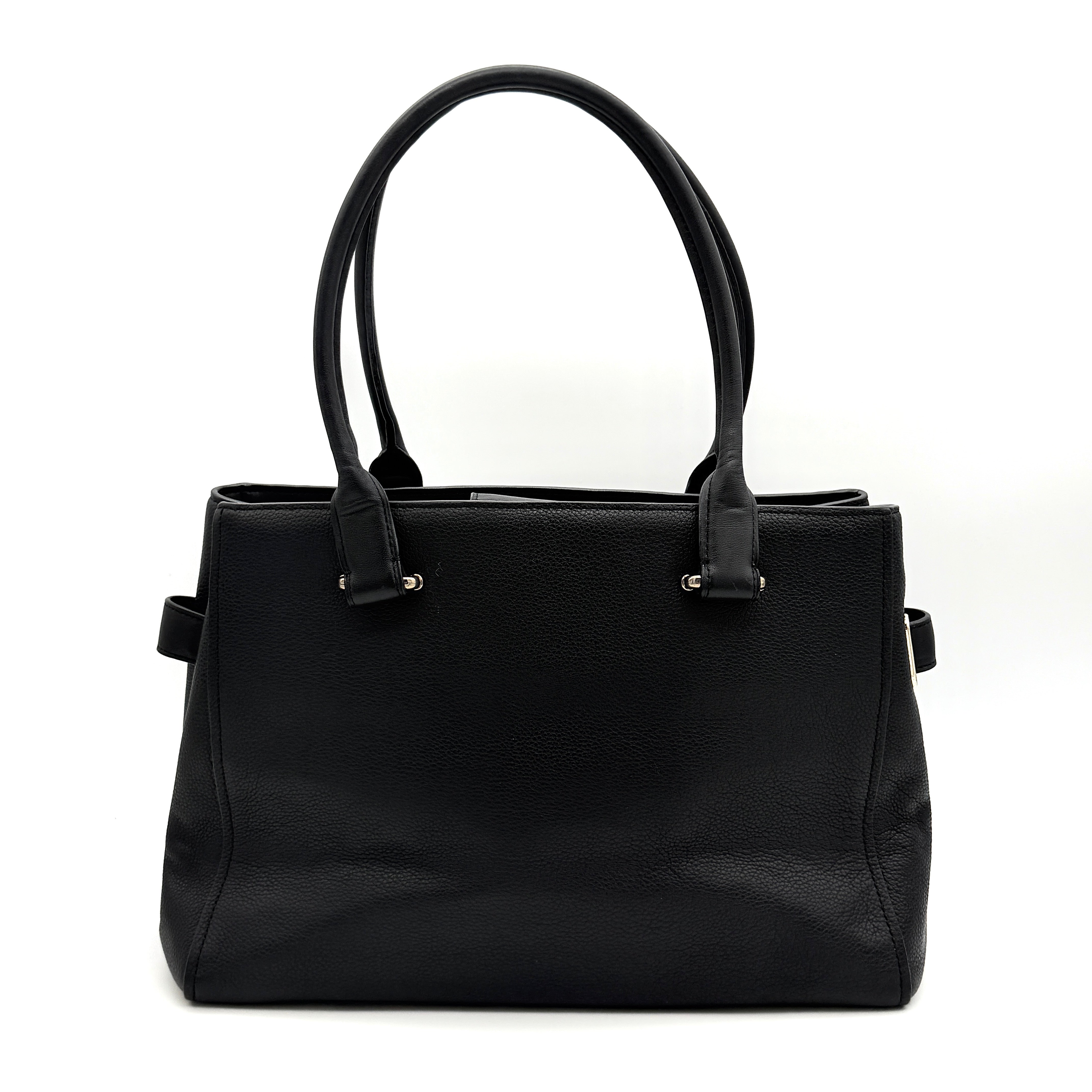 Coach Swagger Carryall in black pebbled leather with gold-tone hardware and double turnlock detail, shown from the front.
