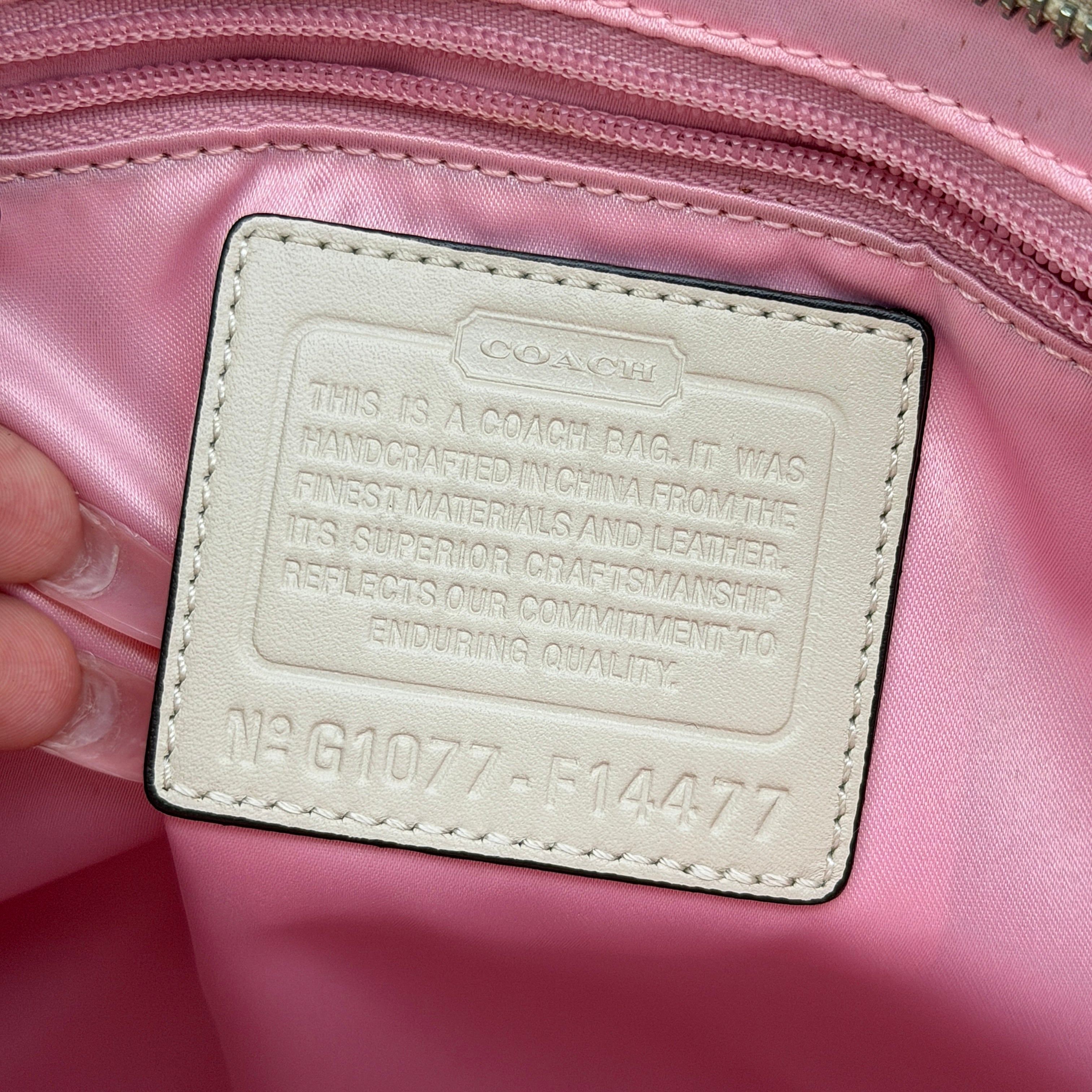 Coach Signature Chelsea Heritage Stripe Tote in beige with pink and cream accents, finished with dual-colour hangtag and leather trim.