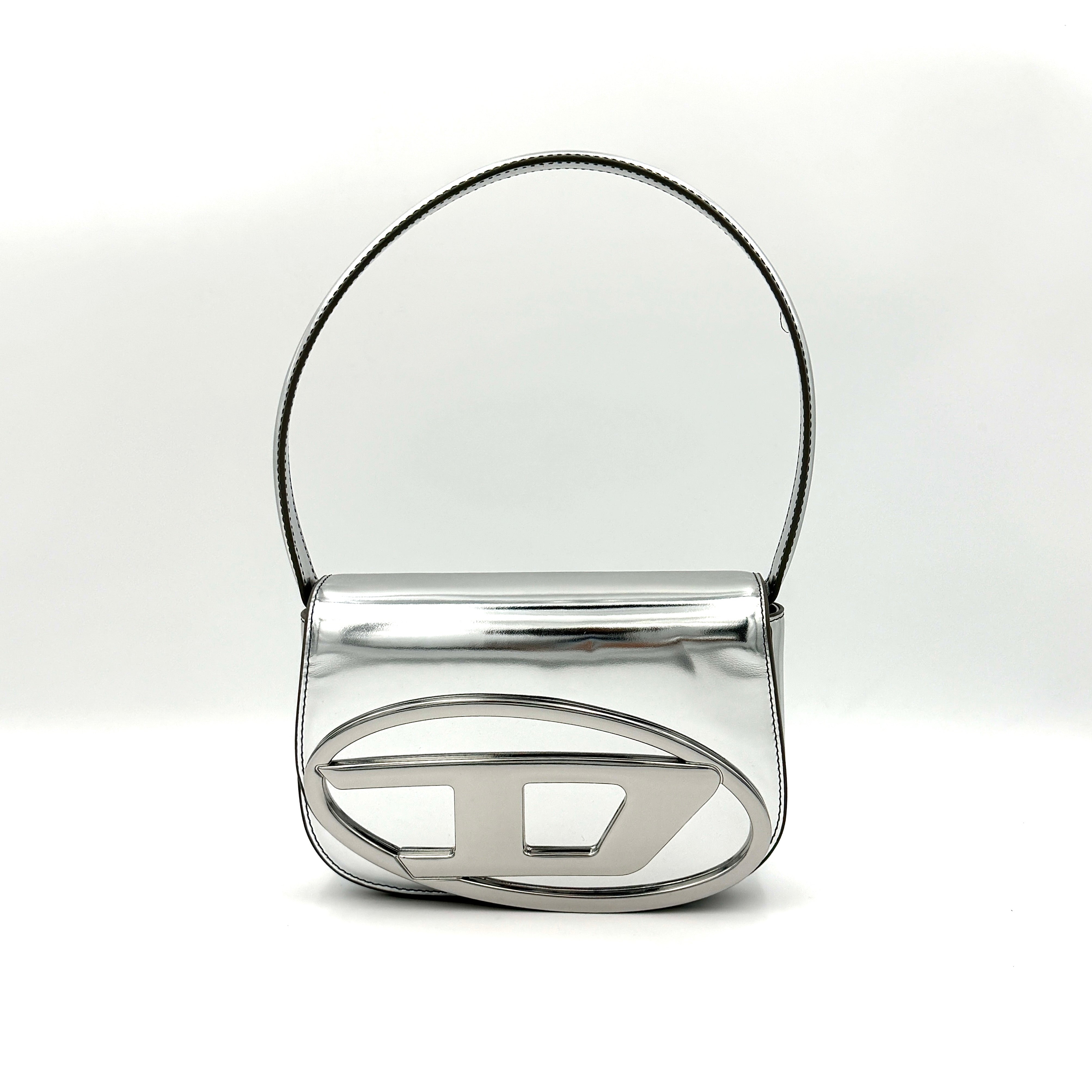 Diesel 1DR 2Way metallic silver shoulder bag with sculptural D logo and detachable strap displayed against a plain background.