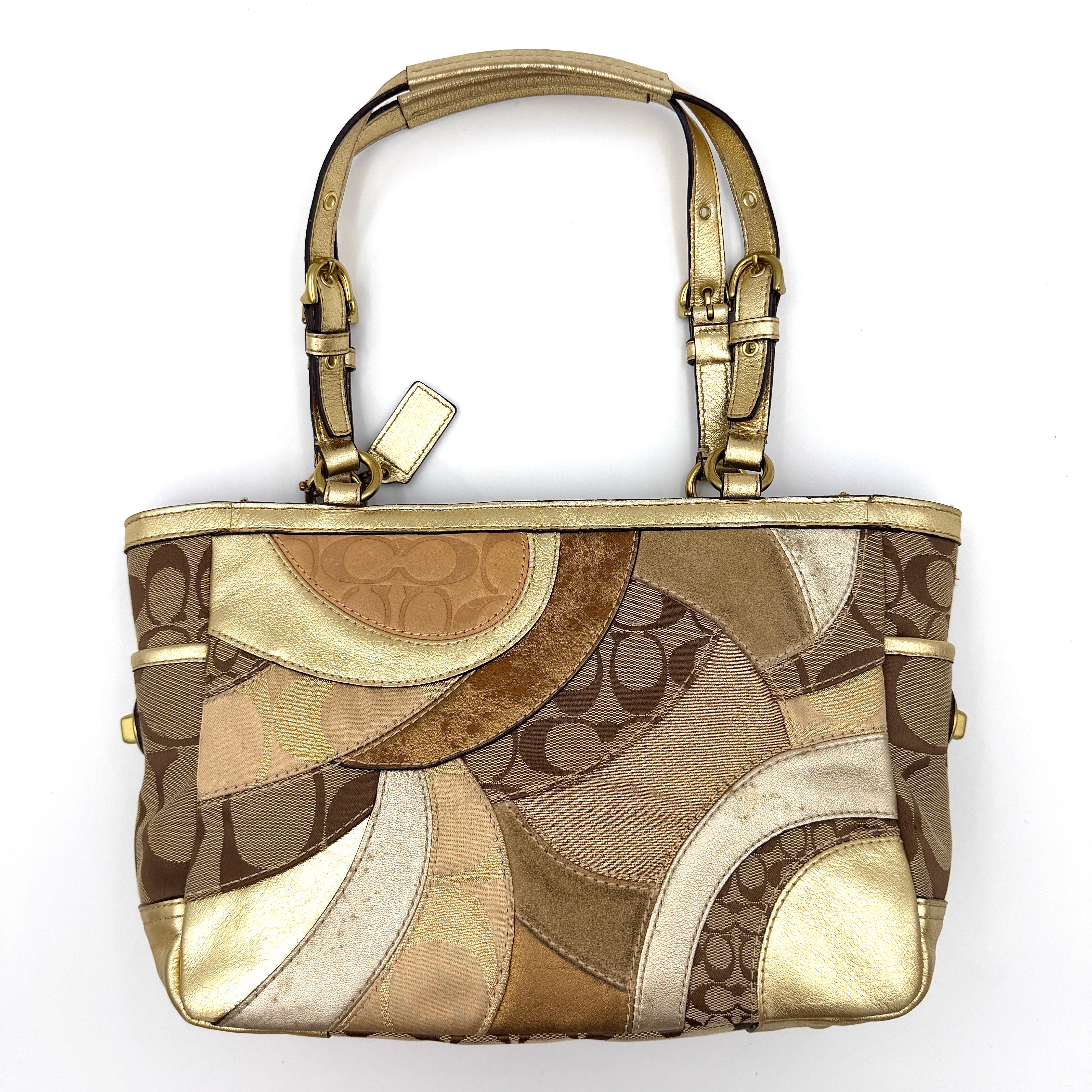 Coach Gallery Tote in a geometric patchwork of gold, beige, and tan with signature monogram and metallic leather against a white background.