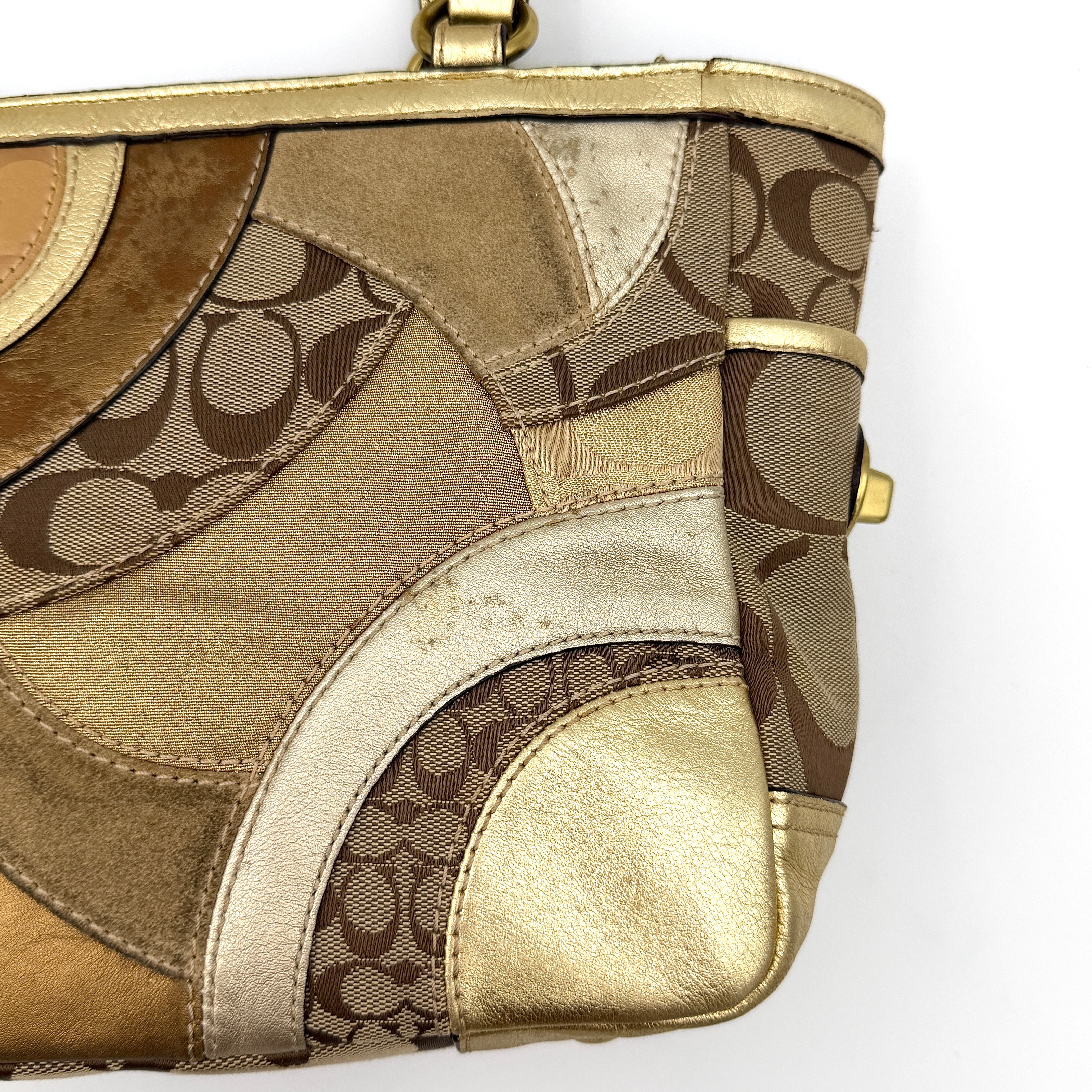 Coach Gallery Tote in a geometric patchwork of gold, beige, and tan with signature monogram and metallic leather against a white background.