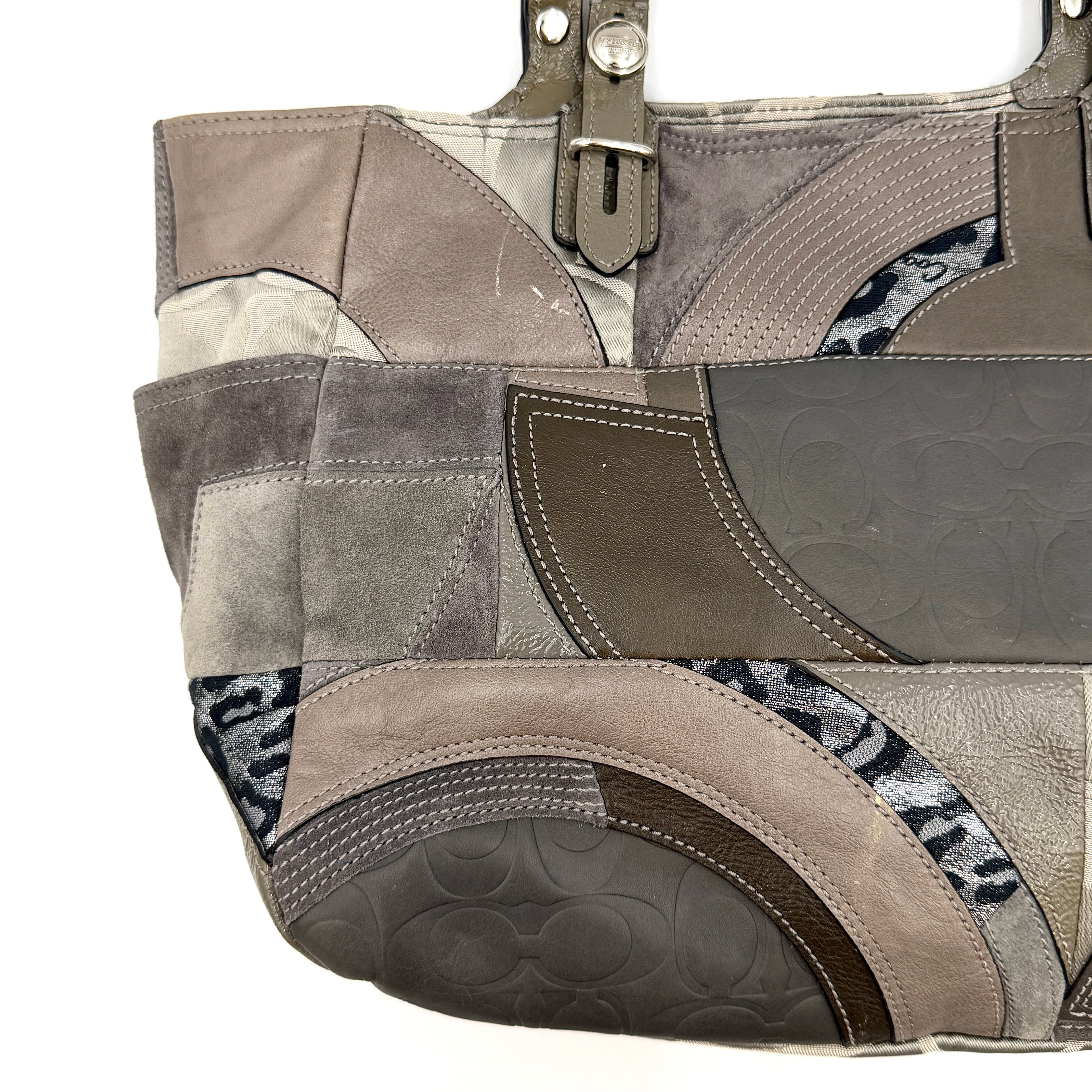Coach Y2K patchwork tote in grey tones with jacquard, suede, and ocelot-print panels, shown with double handles and signature tag.
