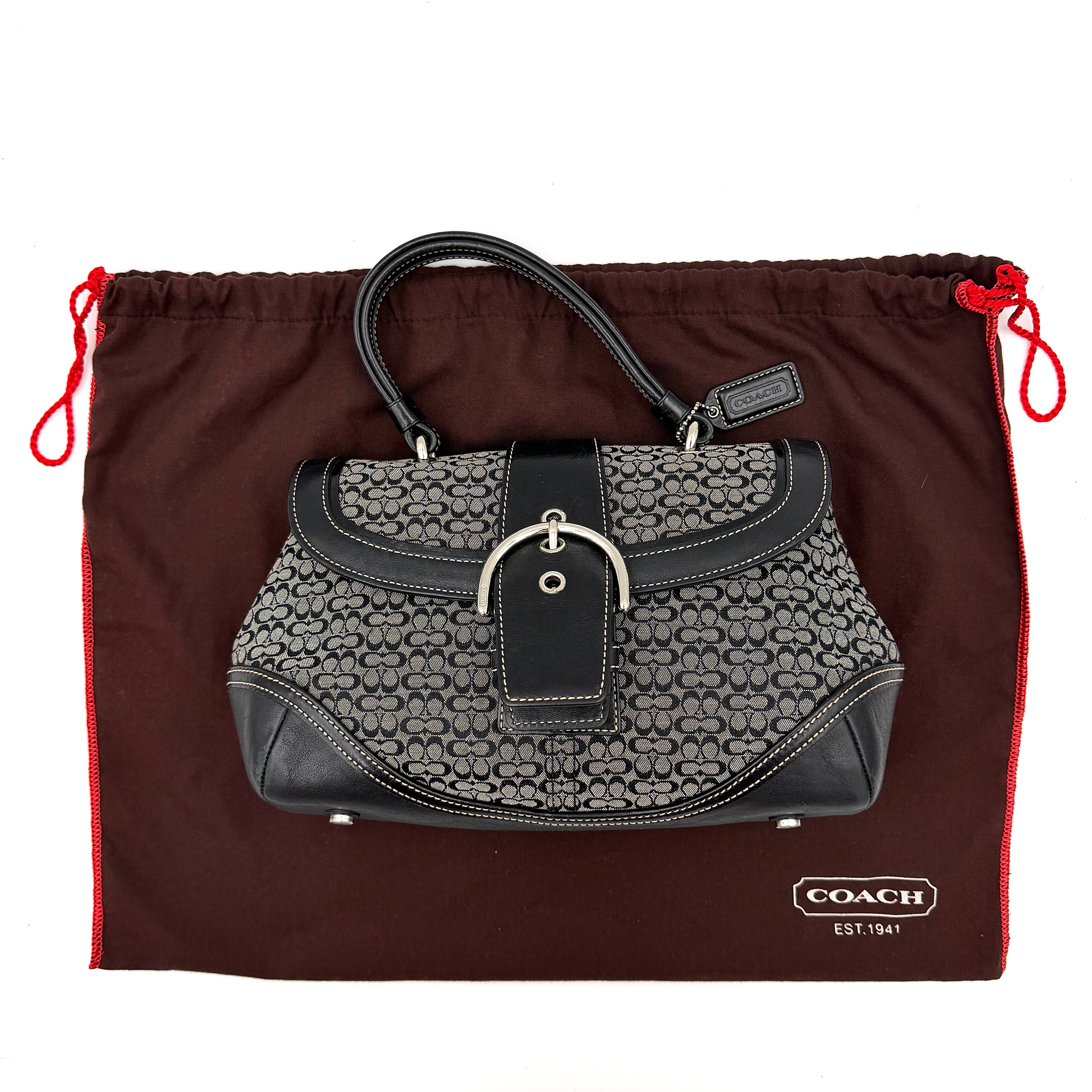 Coach Y2K Signature Soho Shoulder Bag in grey and black canvas with black leather trim and silver hardware, top handle style.