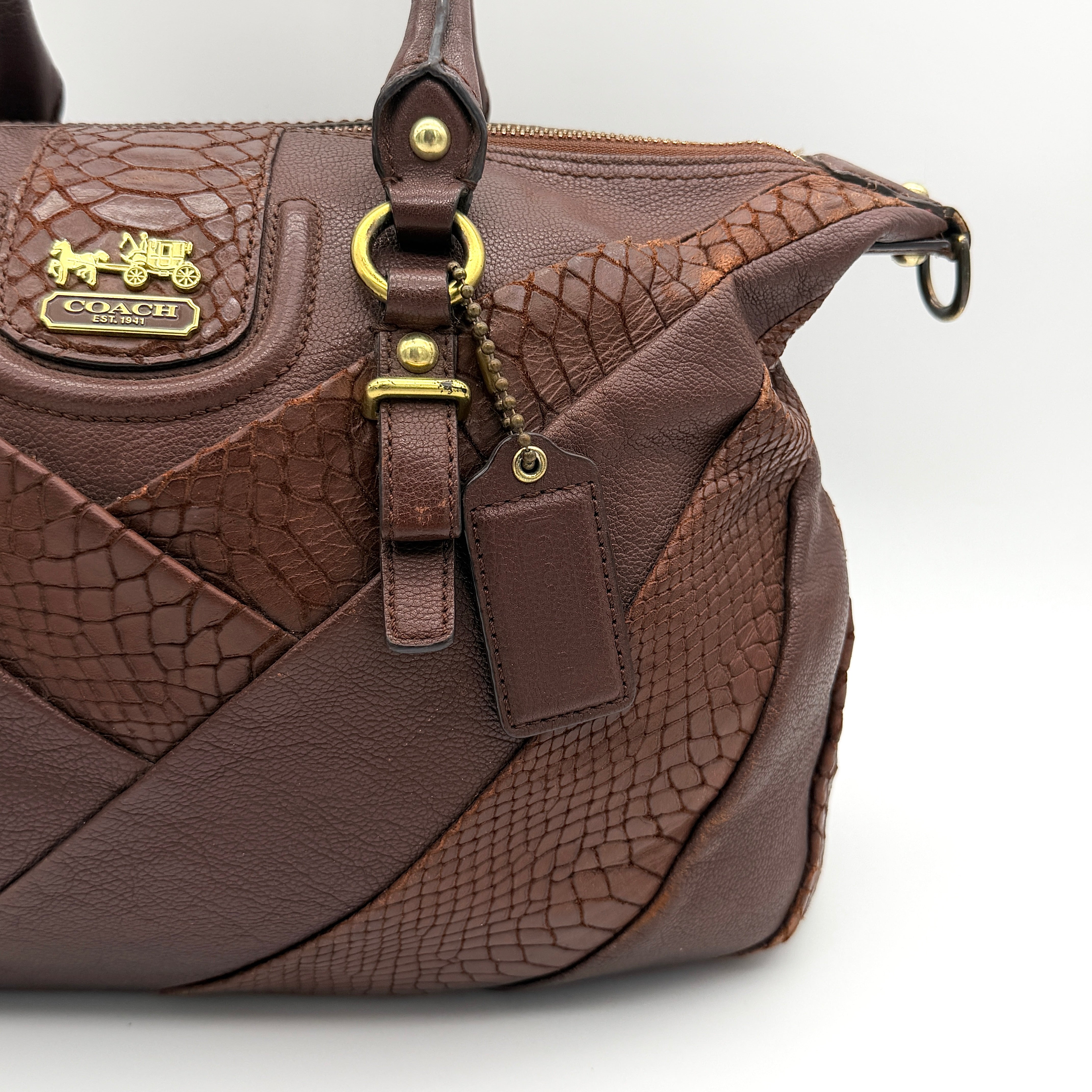 Coach Madison Lindsey 2Way handbag in brown python-embossed leather with gold-tone hardware and detachable strap.