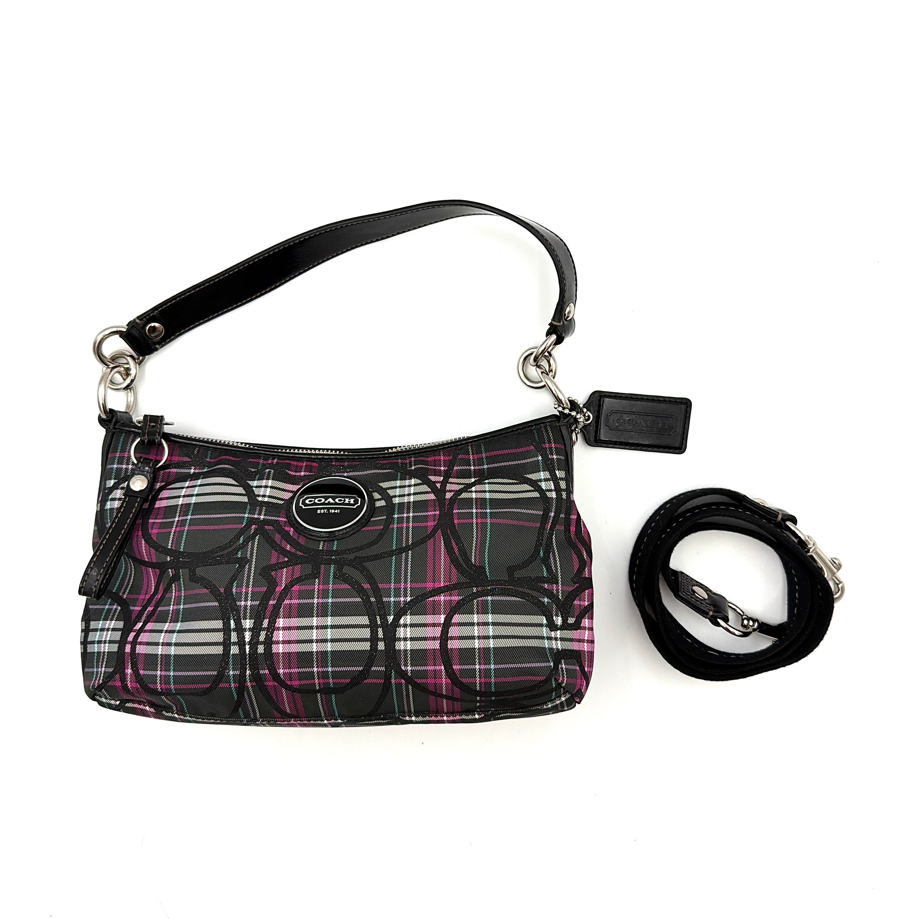 Coach Poppy tartan shoulder bag in black, magenta, and teal plaid with detachable black leather strap and silver-tone hardware.