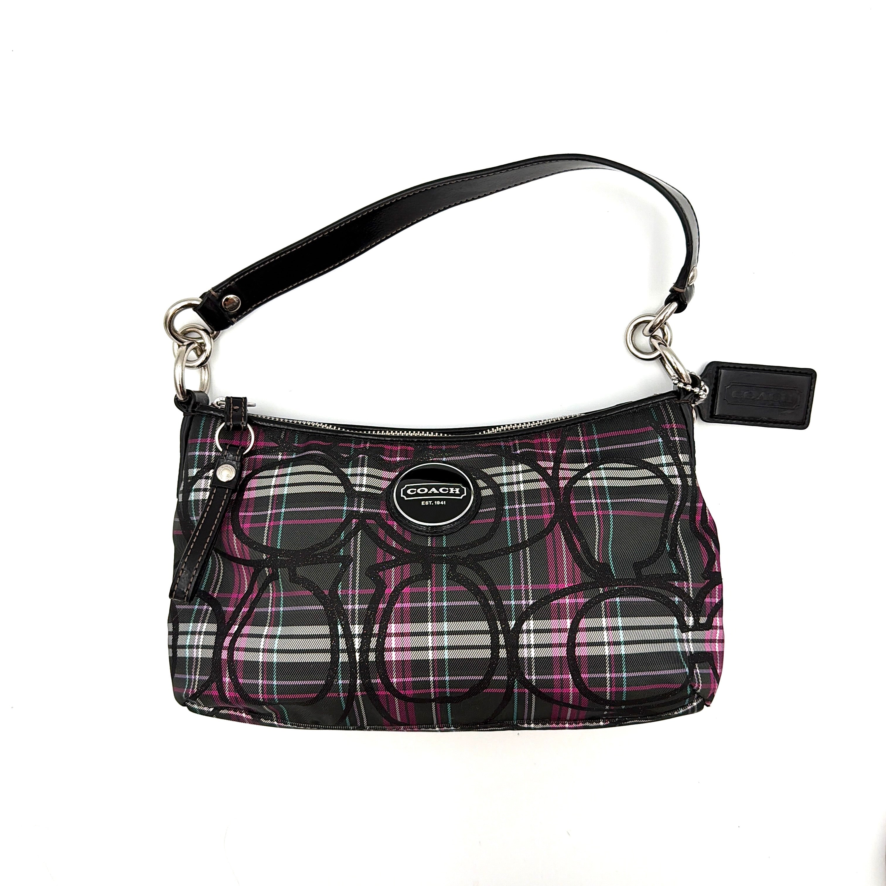 Coach Poppy tartan shoulder bag in black, magenta, and teal plaid with detachable black leather strap and silver-tone hardware.