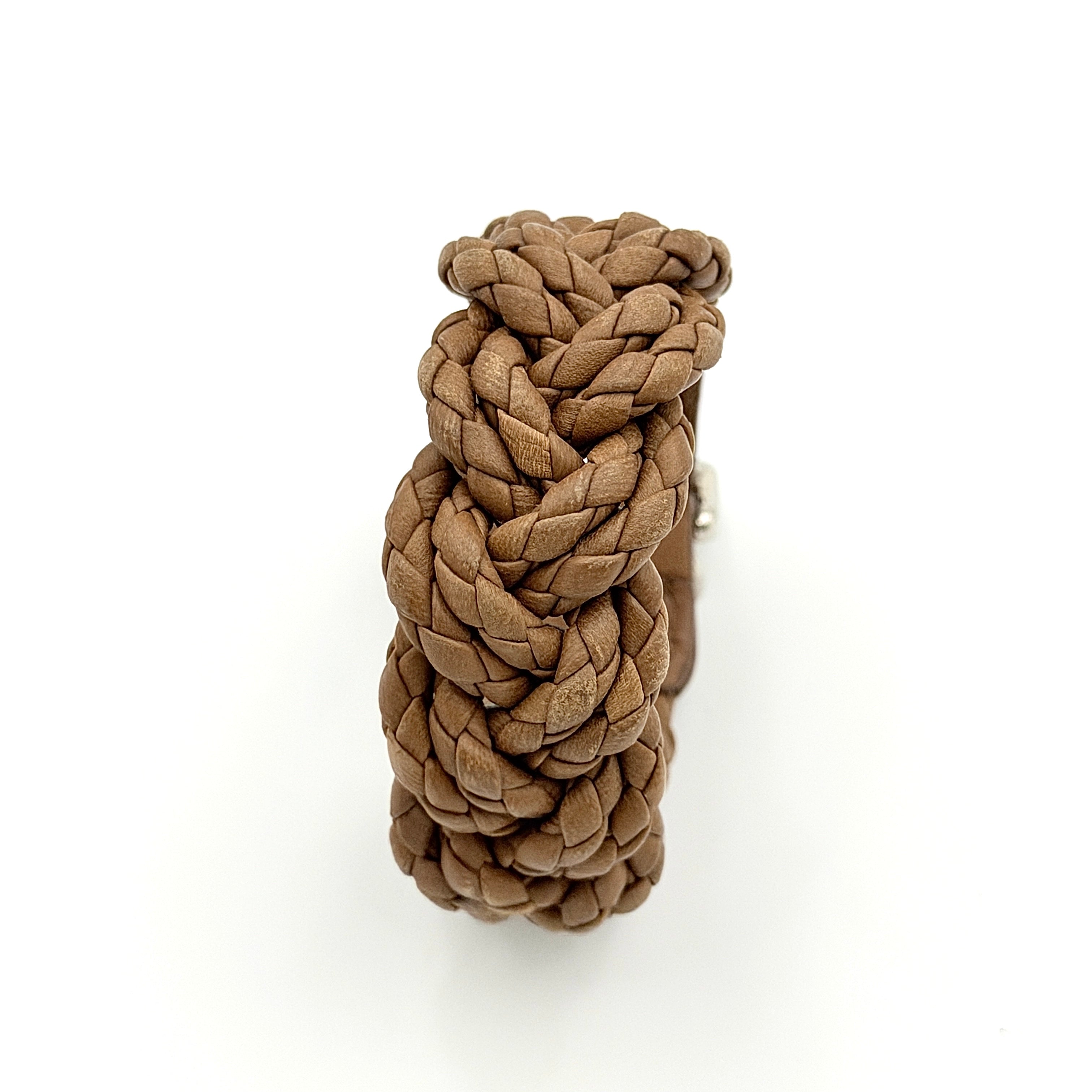 Bottega Veneta brown braided leather bracelet with silver-tone double buckle, displayed on a clean background.