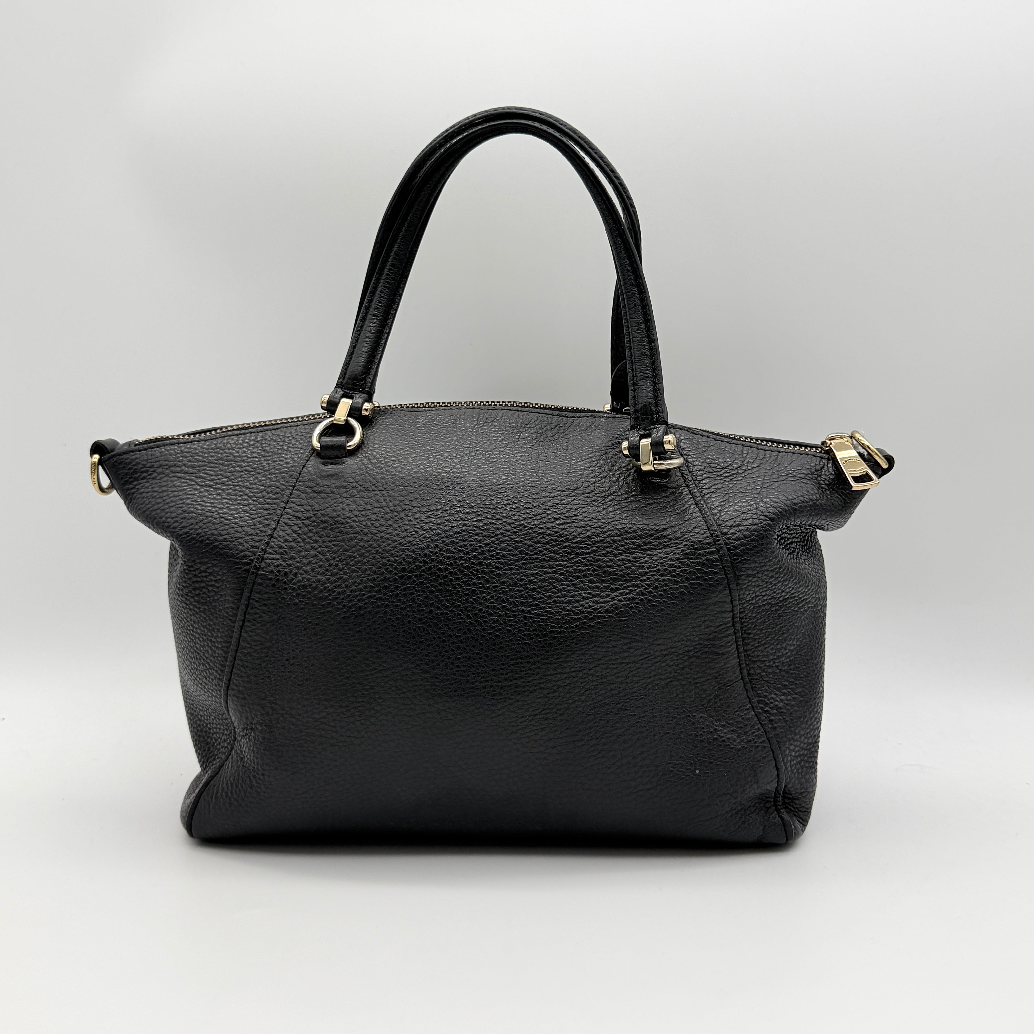 Coach 2Way Prairie Satchel in black grained leather with gold-tone hardware, shown with detachable strap and branded dust bag.