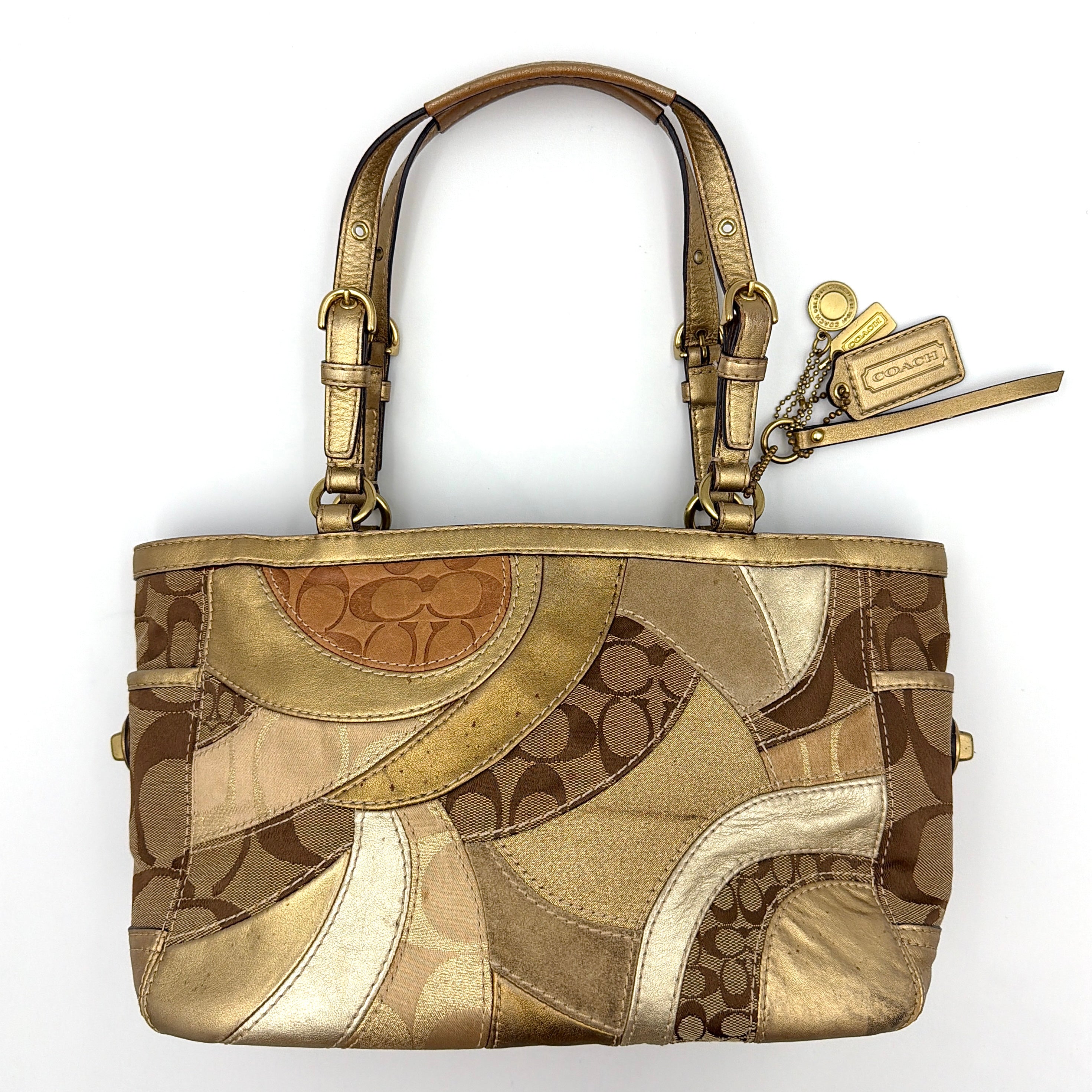 Coach Gallery Tote in mosaic patchwork jacquard and gold leather with signature charms and adjustable handles.