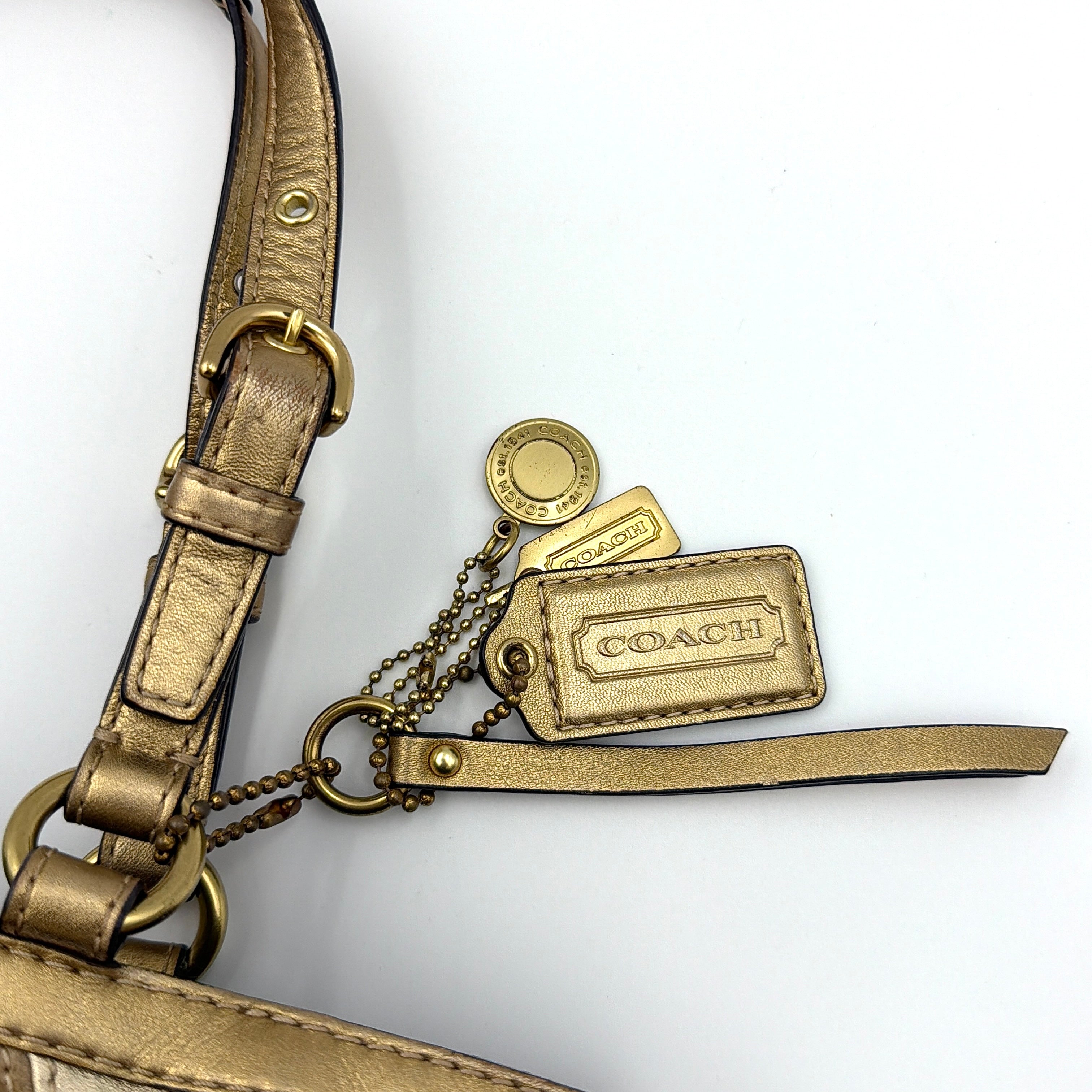 Coach Gallery Tote in mosaic patchwork jacquard and gold leather with signature charms and adjustable handles.