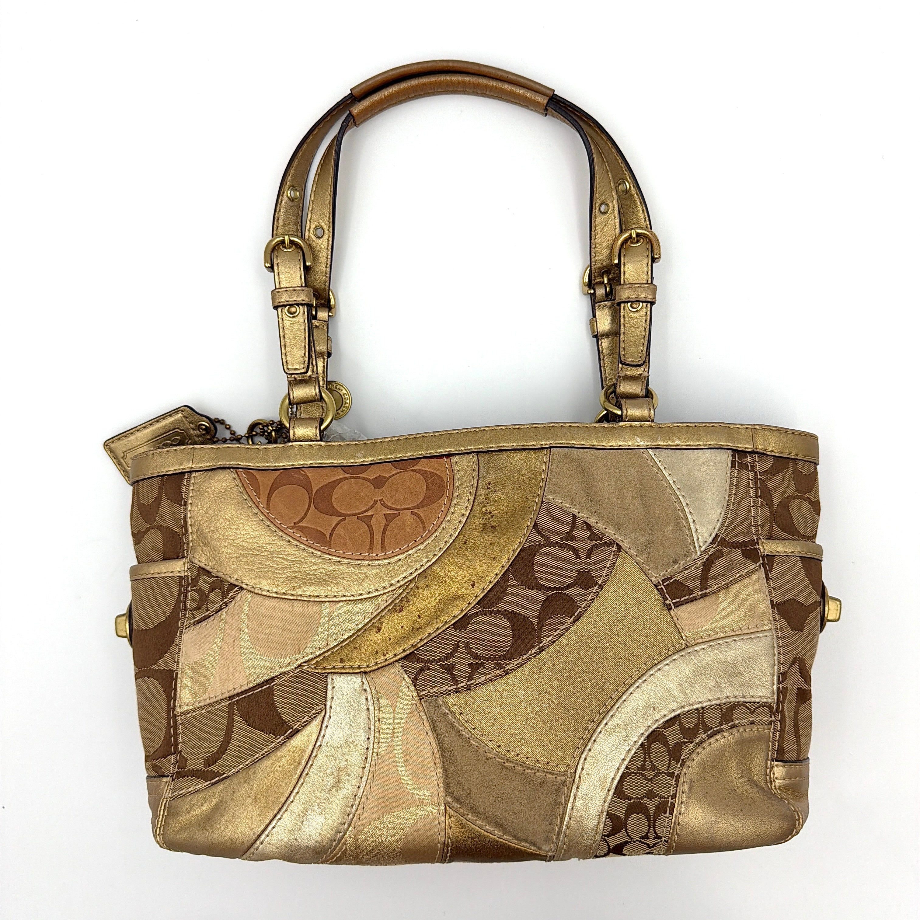 Coach Gallery Tote in mosaic patchwork jacquard and gold leather with signature charms and adjustable handles.