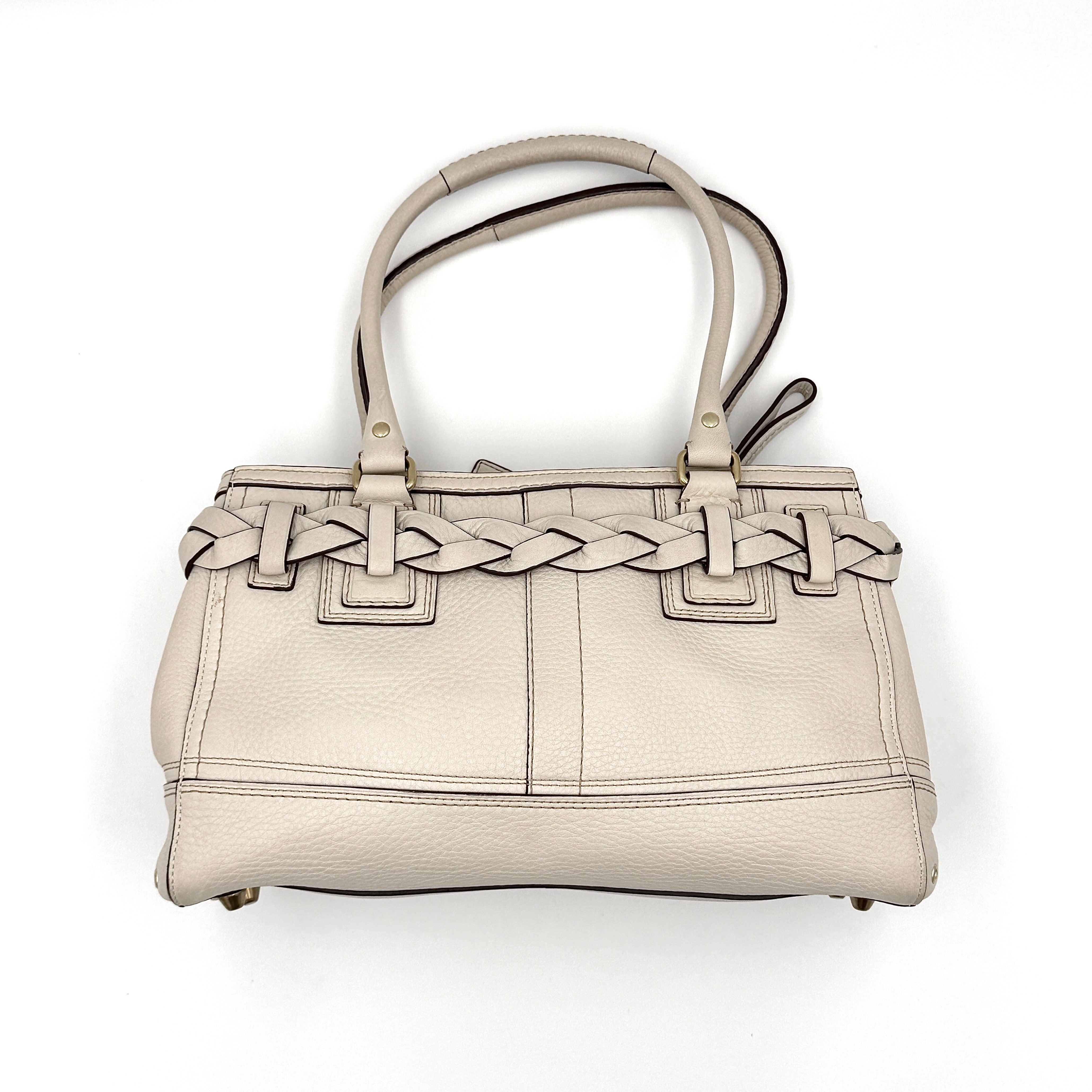 Coach Signature Hampton Carryall Shoulder Bag in ivory pebbled leather with gold-tone hardware and braided detailing, shown from the front.