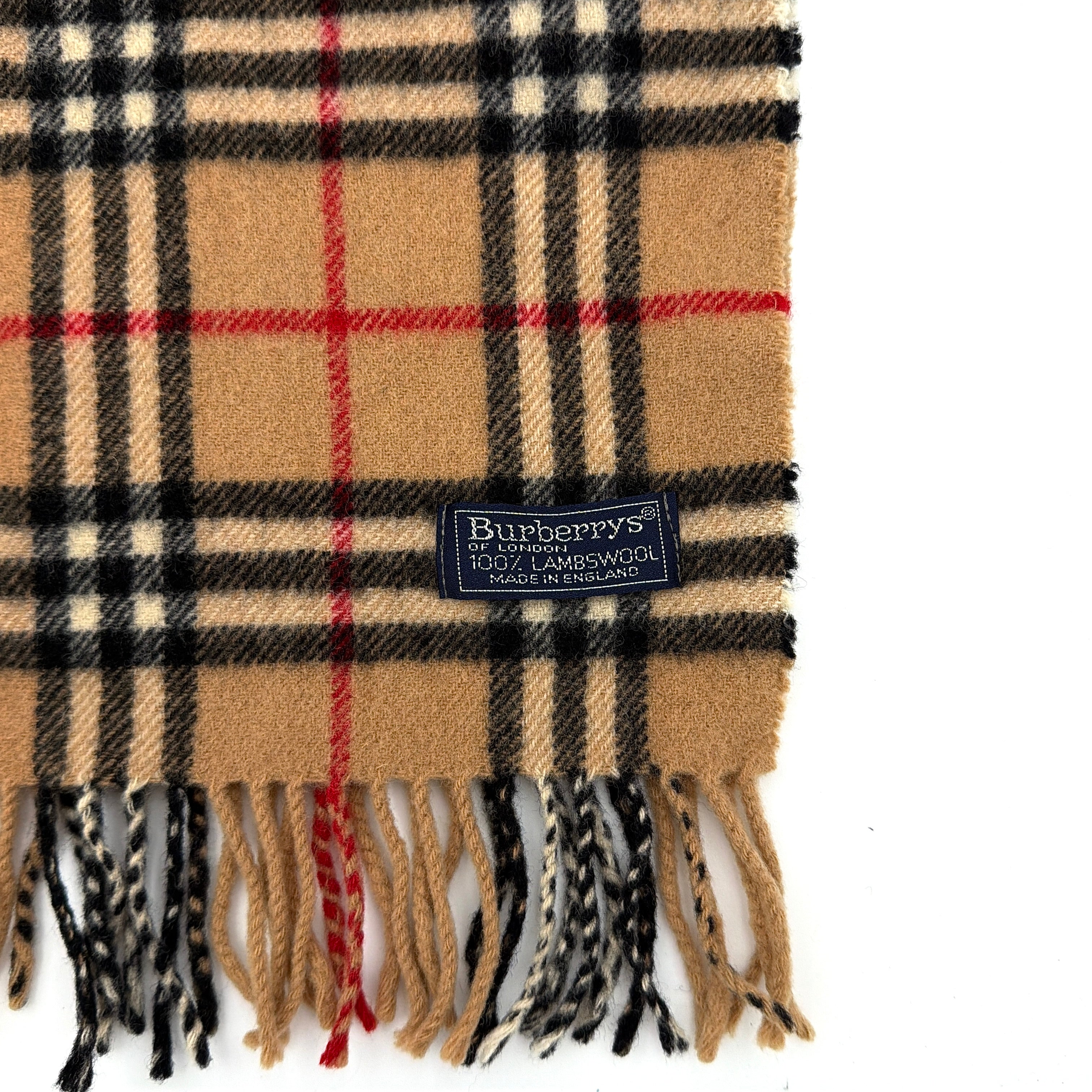 A Burberry Nova Check beige wool scarf with the classic check pattern and twisted fringe edges, finished with a navy woven logo label.