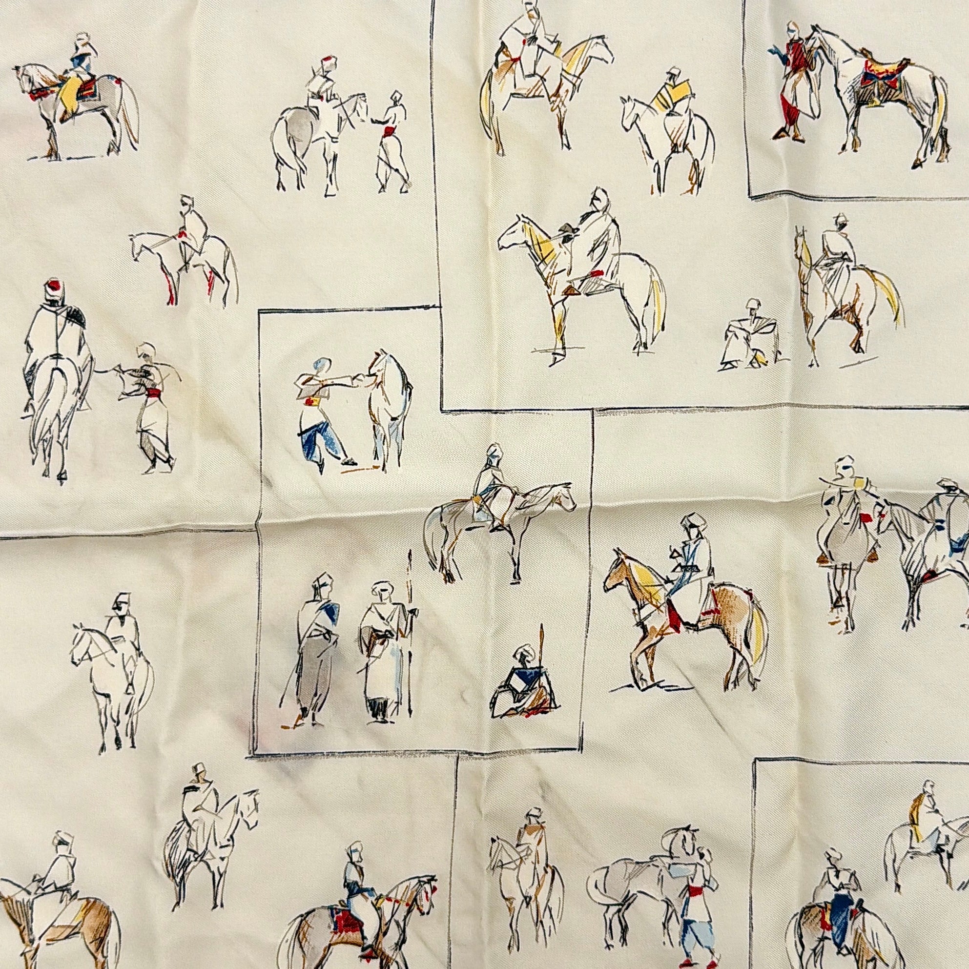 Hermès Voyage au Niger silk scarf in navy blue with cream center, featuring illustrative equestrian sketches bordered in red.