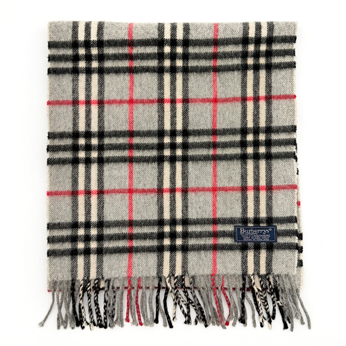 Burberry London grey Nova Check cashmere scarf with classic check pattern and fringe ends, shown carefully folded.