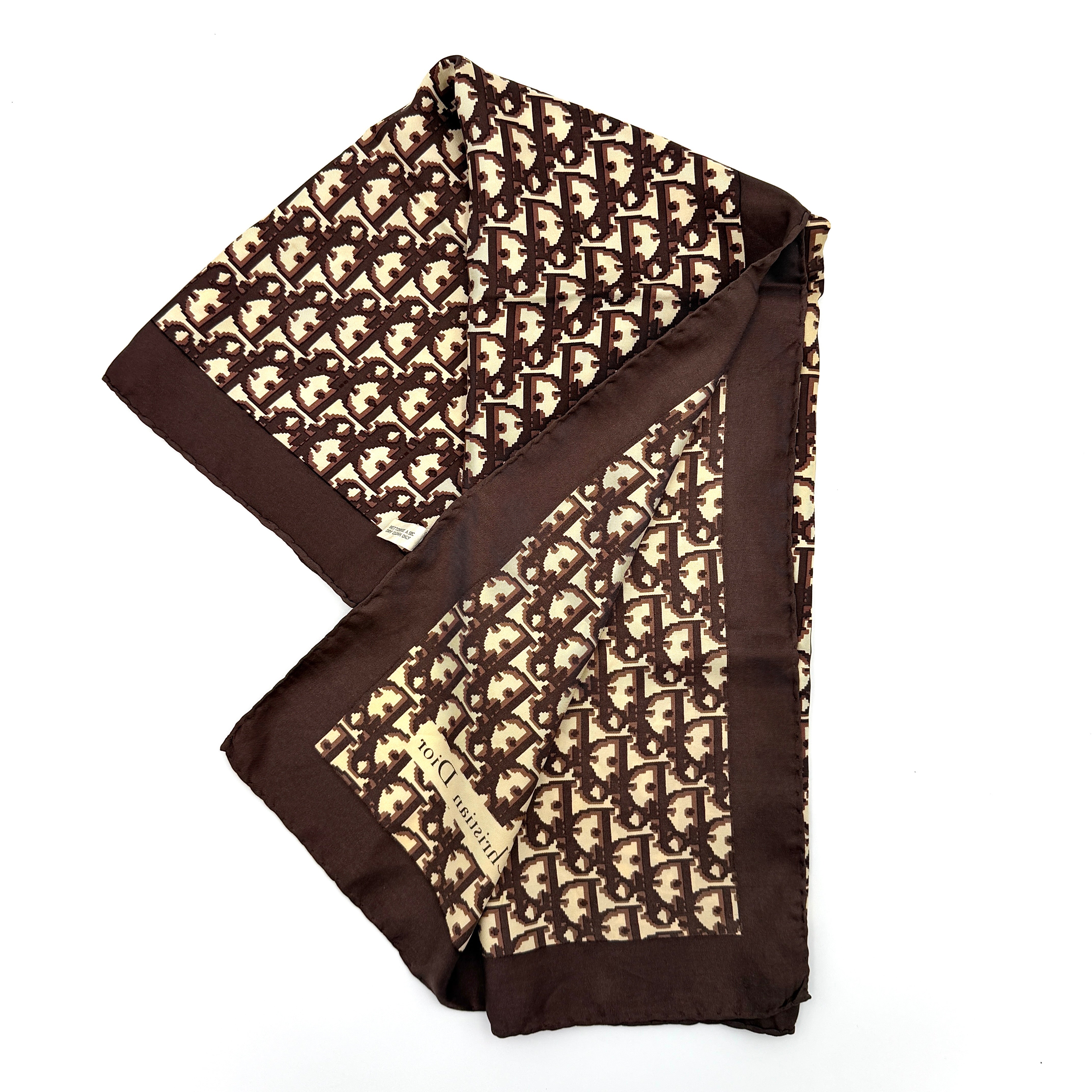 Dior Monogram Silk Scarf in brown and cream with allover Oblique pattern and Christian Dior signature in the corner.