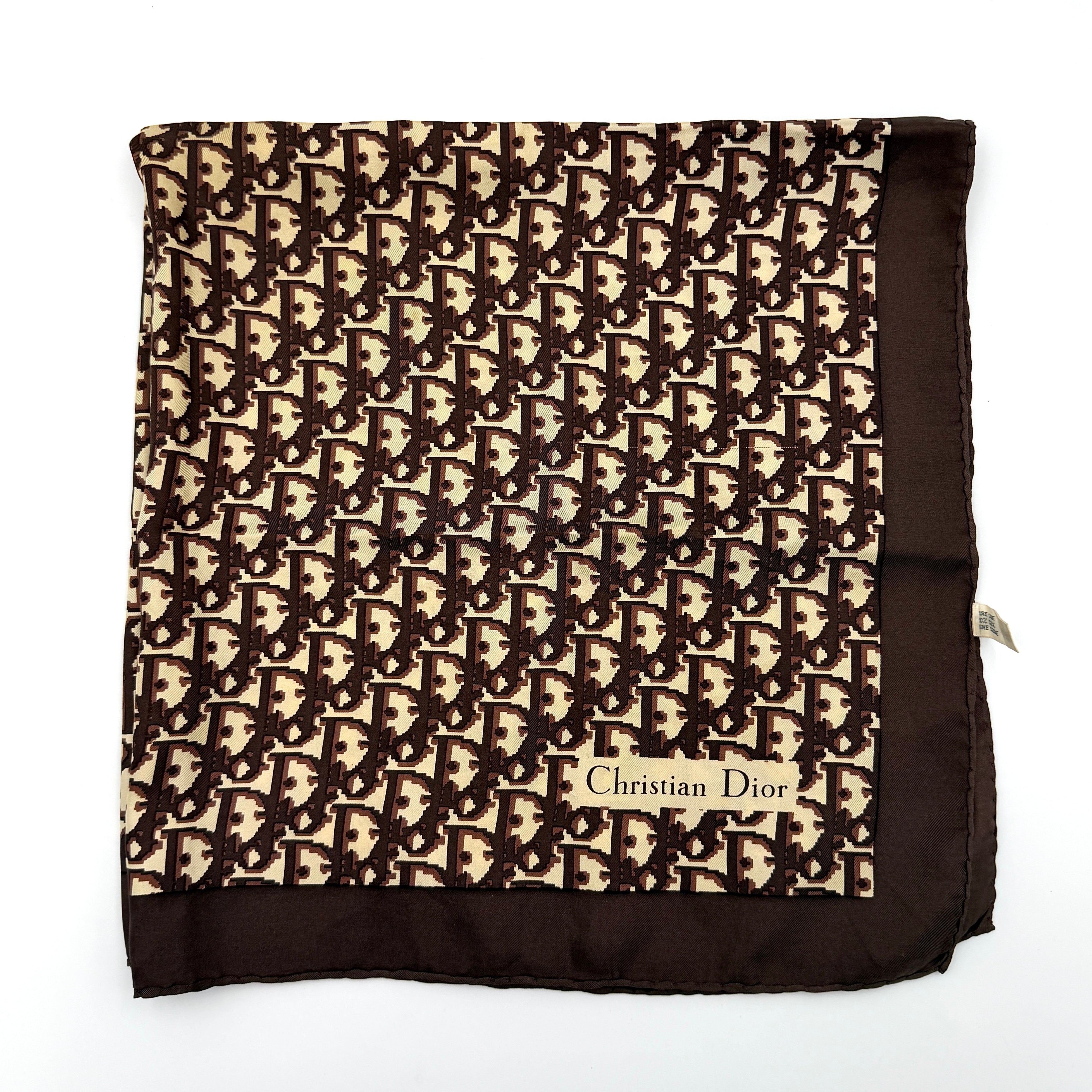 Dior Monogram Silk Scarf in brown and cream with allover Oblique pattern and Christian Dior signature in the corner.