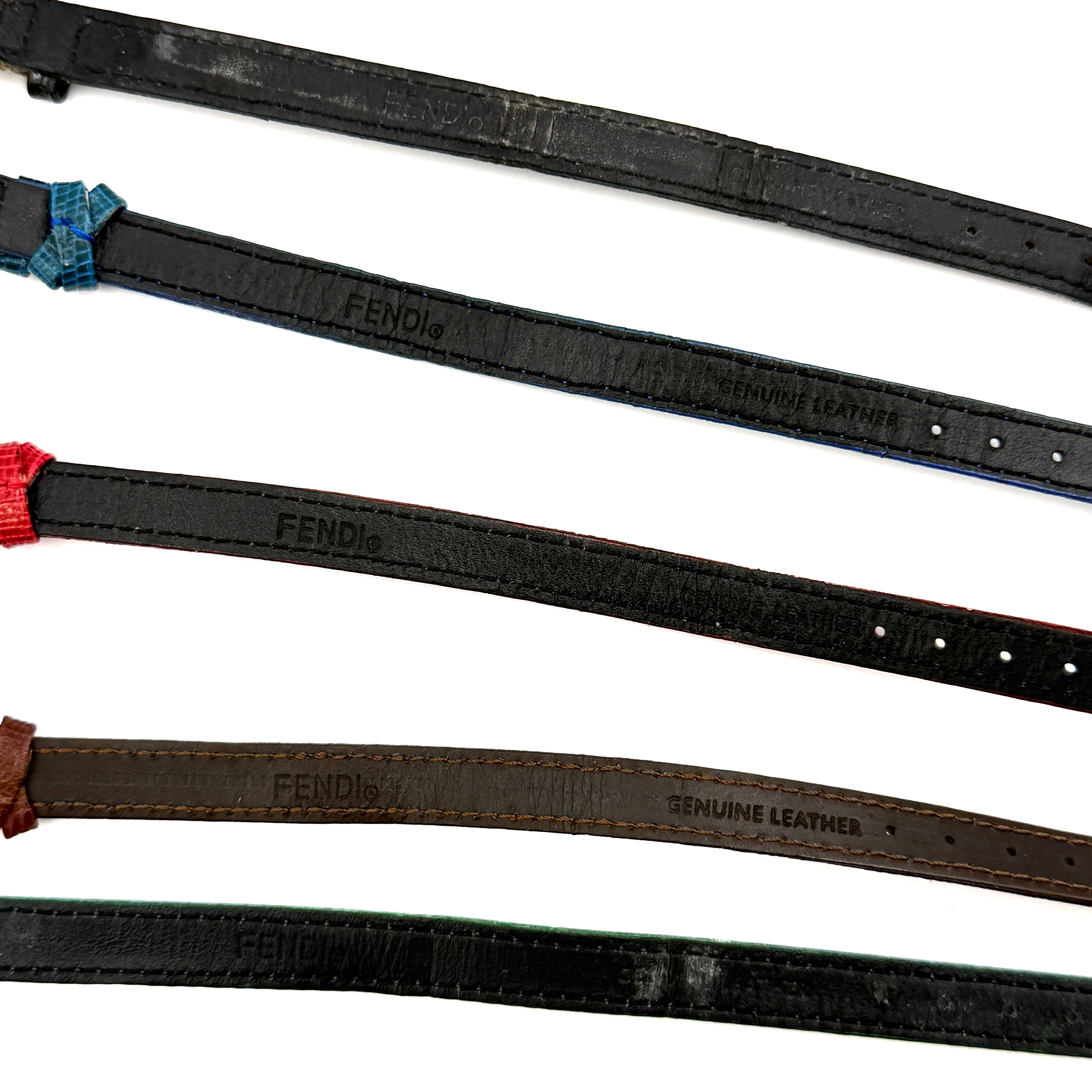Fendi 640L Chameleon watch with five colored leather straps and gold-tone case displayed in a row.