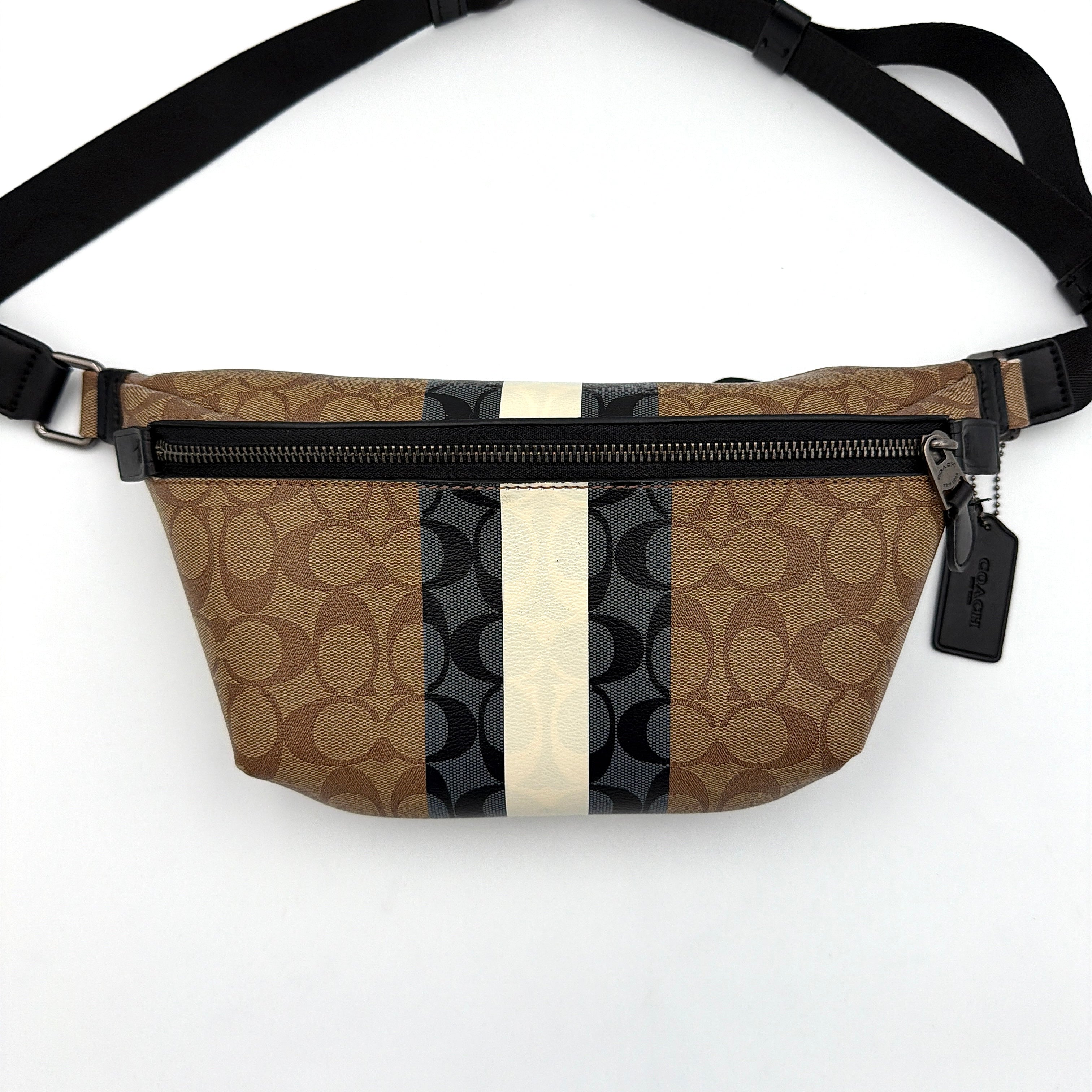Coach Signature Warren Stripe Belt Bag in beige canvas with black and ivory vertical stripes and adjustable black strap.