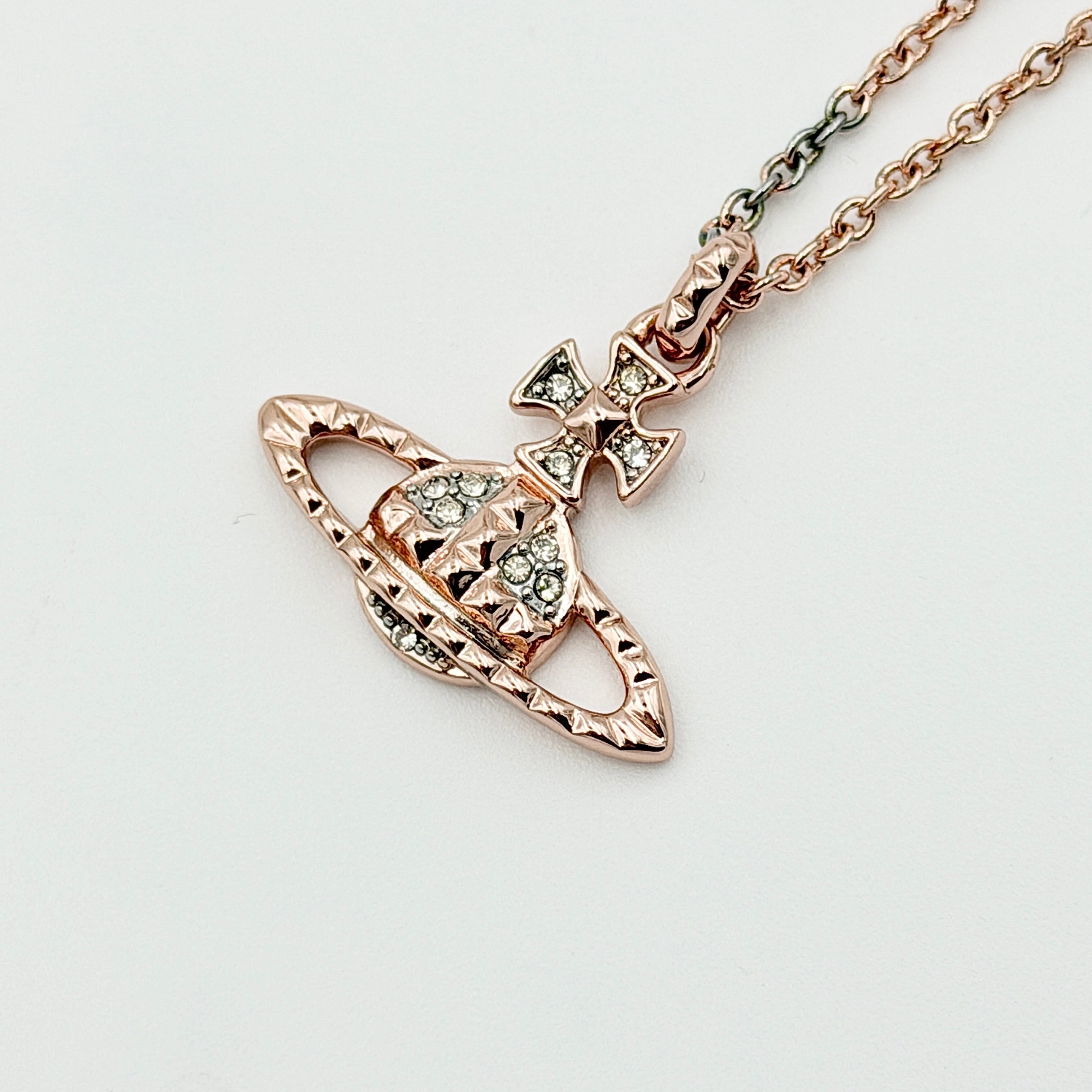Vivienne Westwood Orb Necklace in rose gold and silver, presented on a fine chain with the signature crystal-embellished pendant.