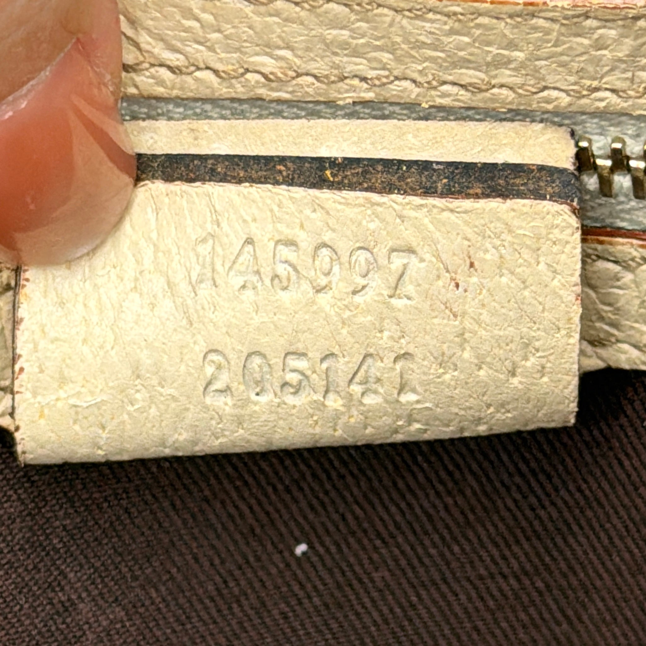 Gucci GG Monogram Stoffa Shoulder Bag in beige canvas with cream leather trim, iconic web stripes, and gold-tone chain detail.