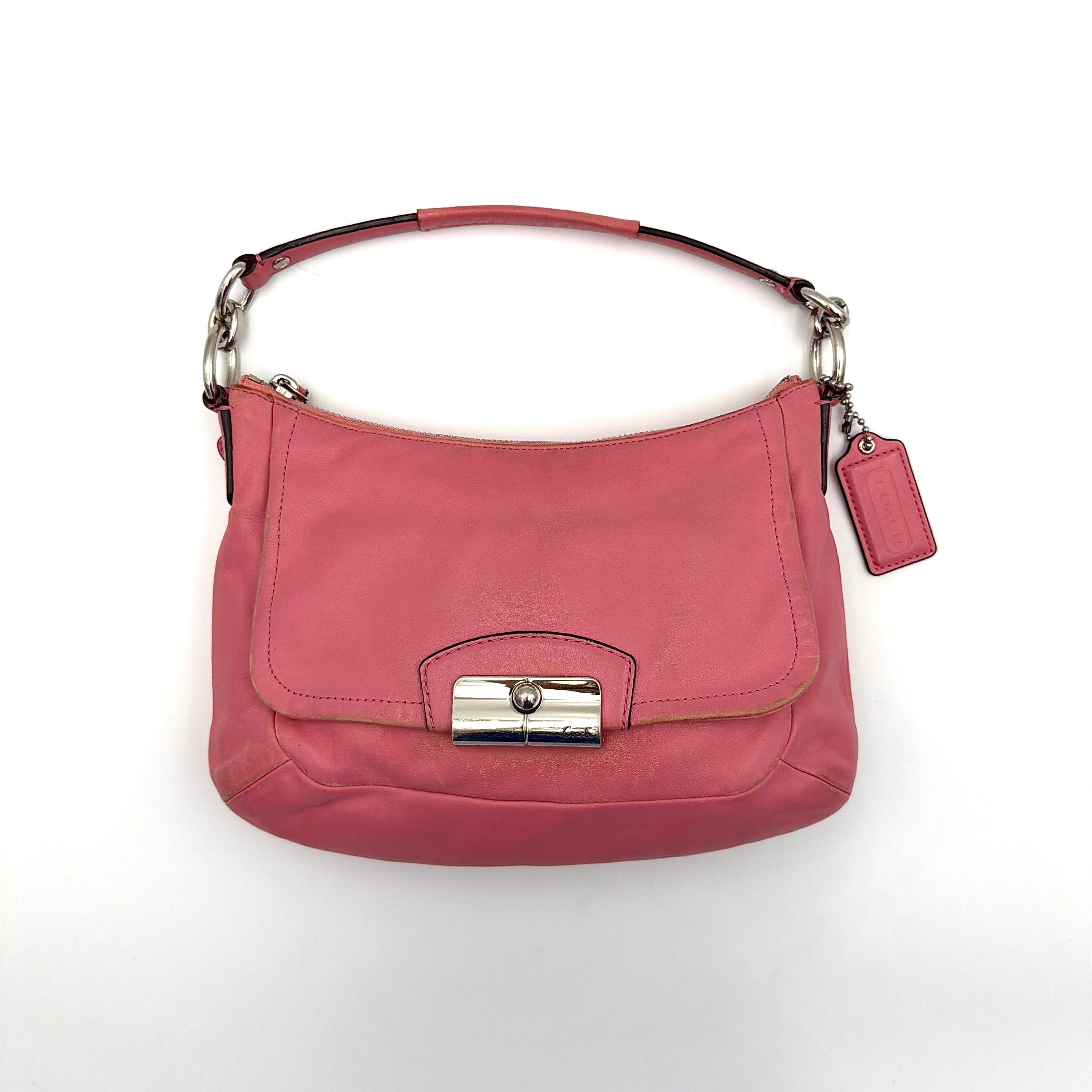Coach Kristin 2Way Shoulder Bag in pink leather with silver hardware and detachable strap, displayed with both handle and crossbody option.