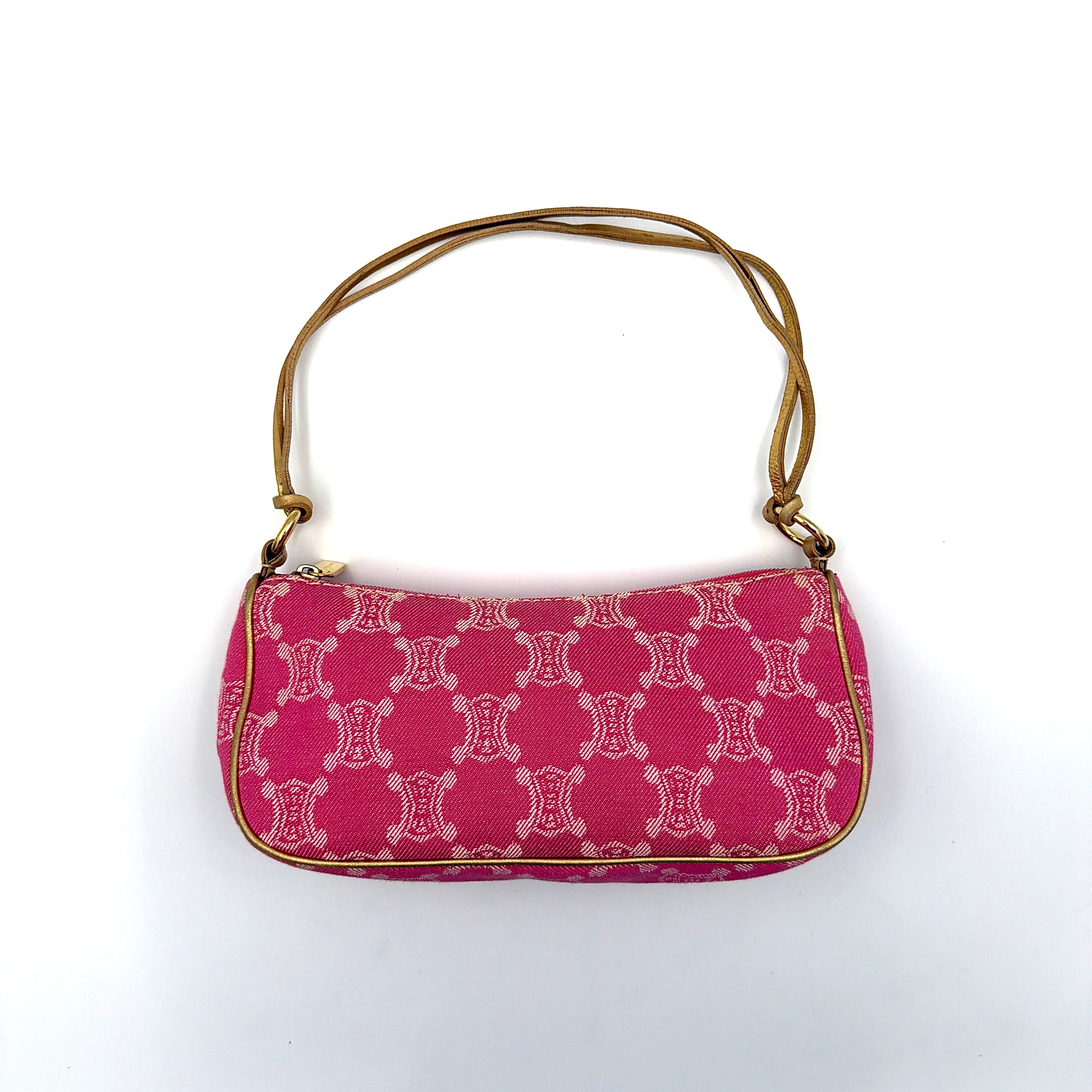 Front view of the Celine Macadam pink denim shoulder bag with gold-tone leather strap and triomphe monogram print.