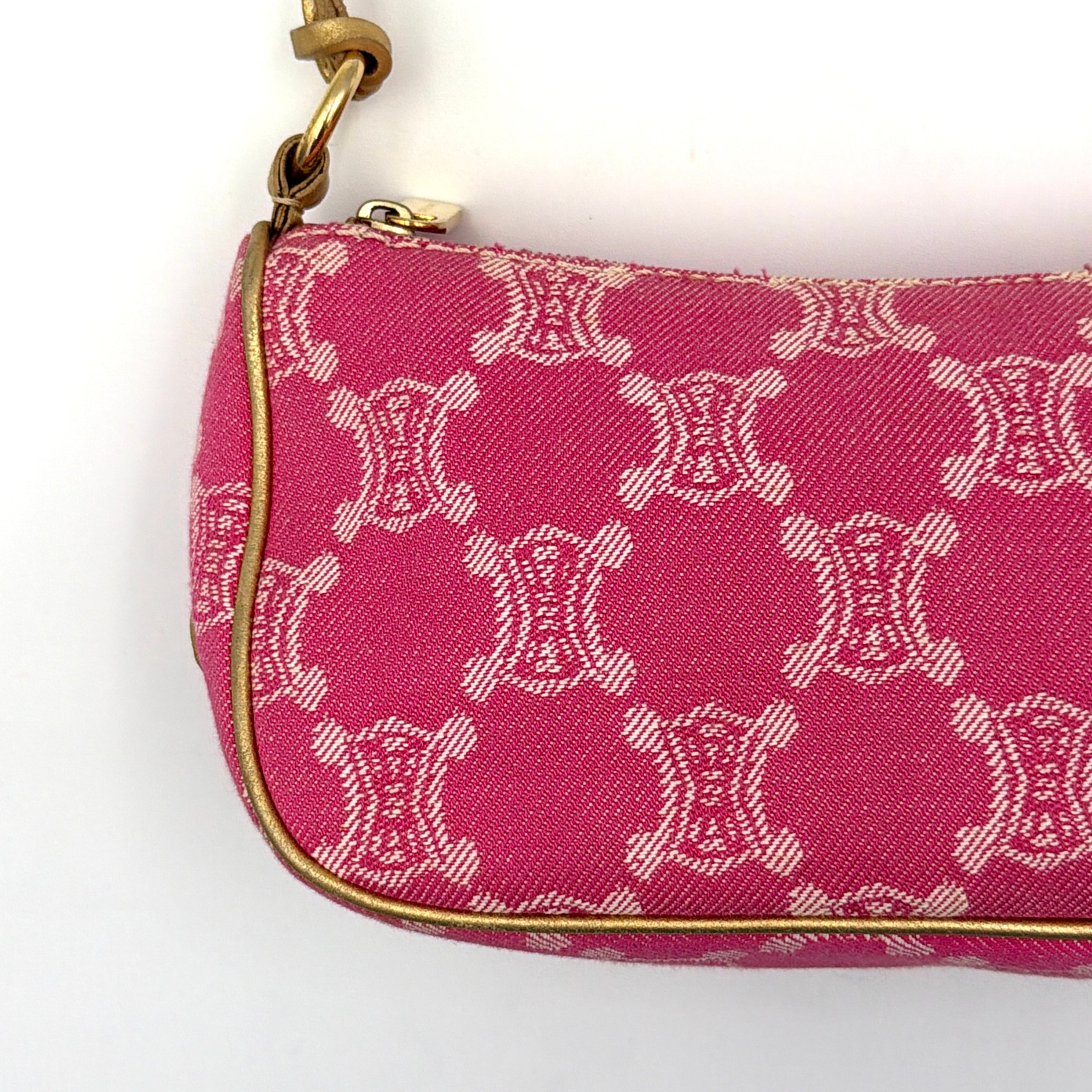 Front view of the Celine Macadam pink denim shoulder bag with gold-tone leather strap and triomphe monogram print.
