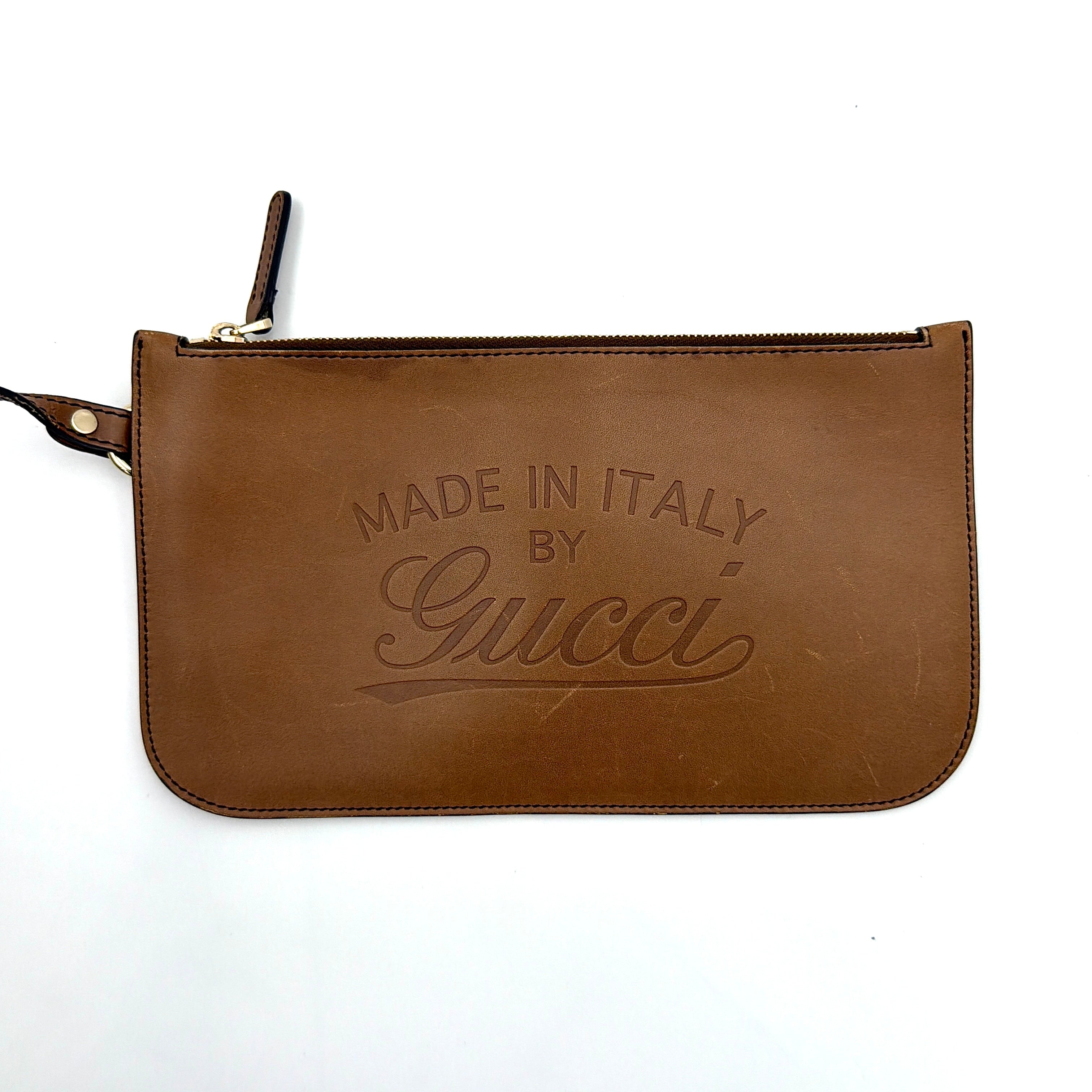 Gucci GG Monogram Craft Shoulder Bag in beige and brown canvas with double leather straps and matching logo-embossed leather pouch.