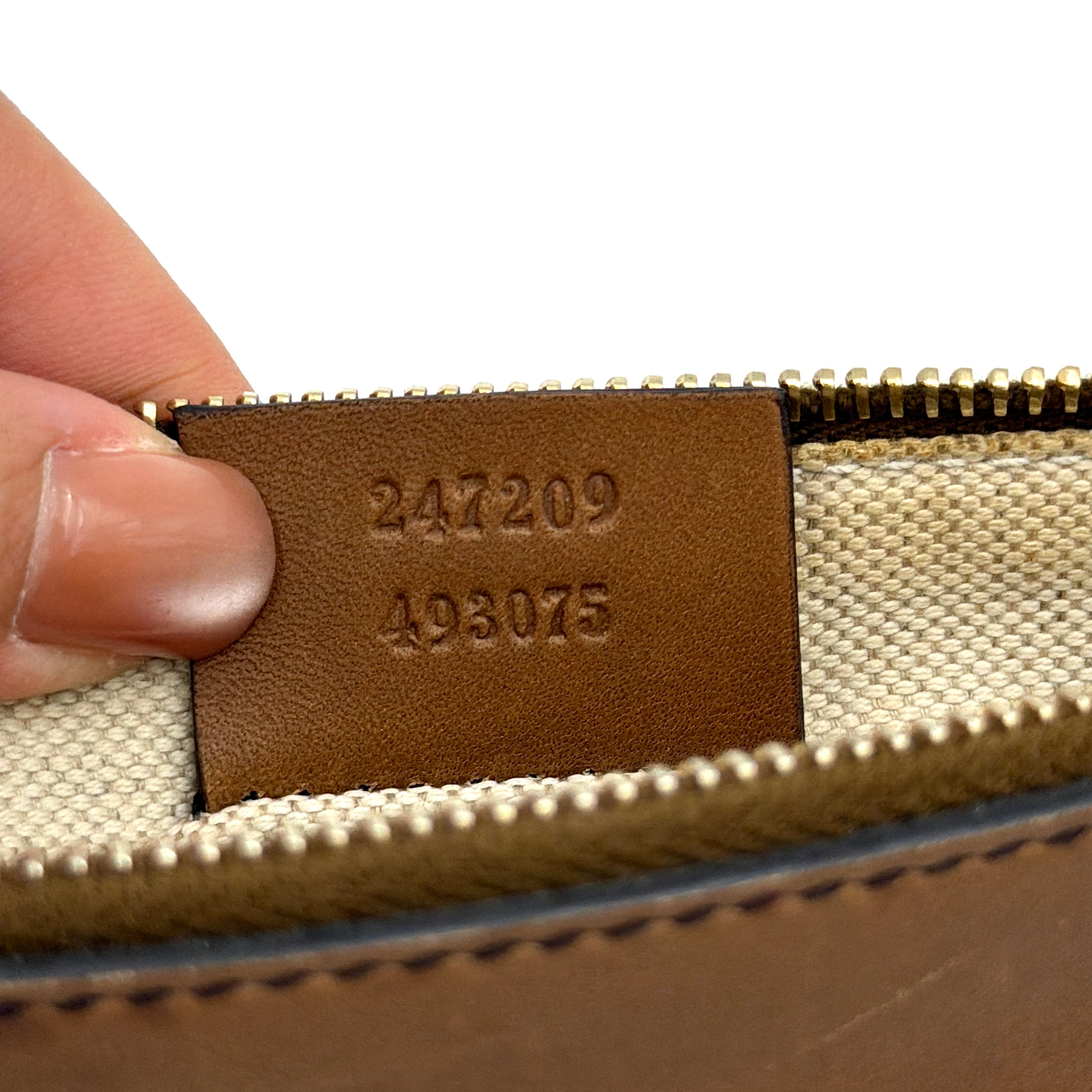 Gucci GG Monogram Craft Shoulder Bag in beige and brown canvas with double leather straps and matching logo-embossed leather pouch.