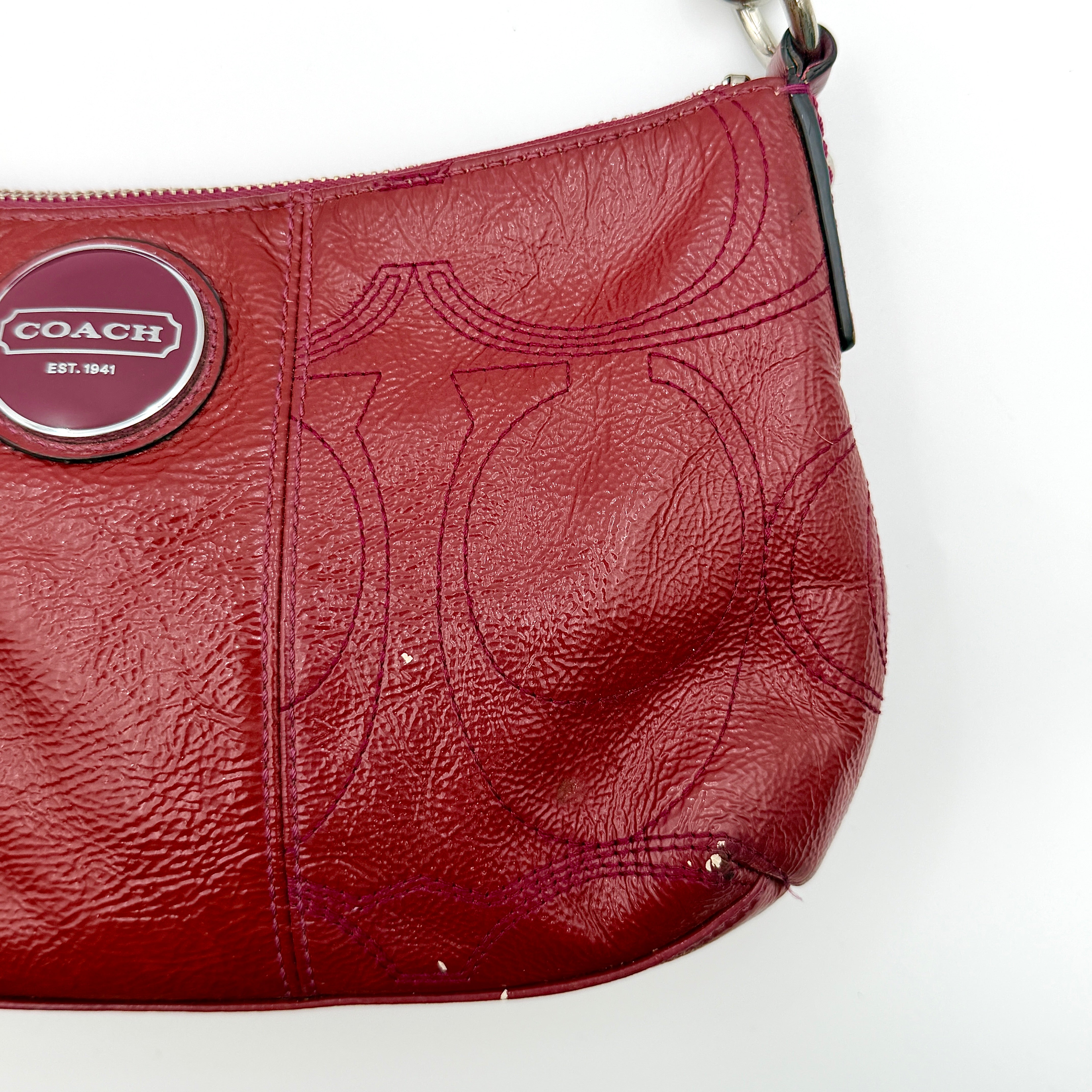 Coach 2Way Signature Stripe Shoulder Bag in red leather with detachable strap, shown against a white background.