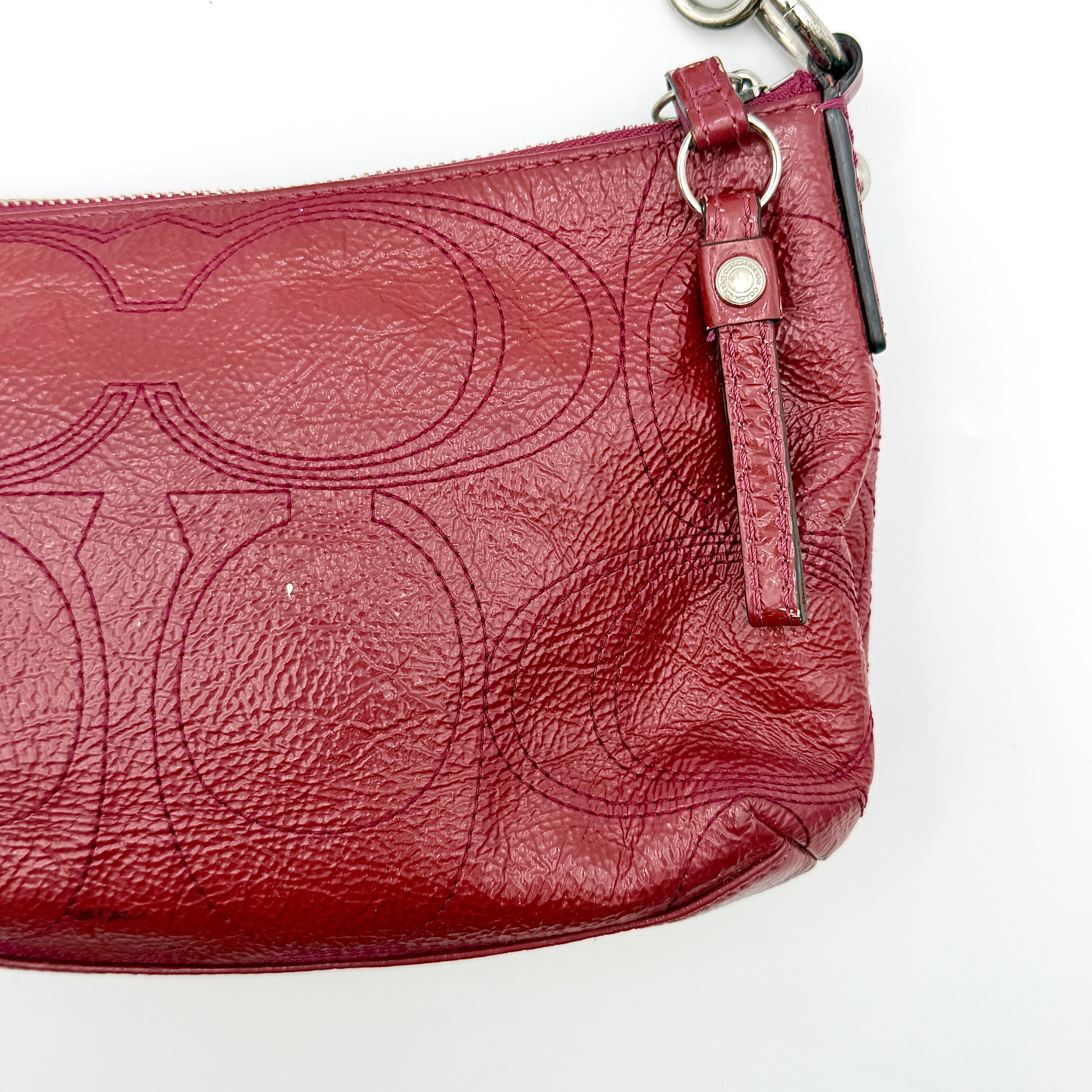 Coach 2Way Signature Stripe Shoulder Bag in red leather with detachable strap, shown against a white background.