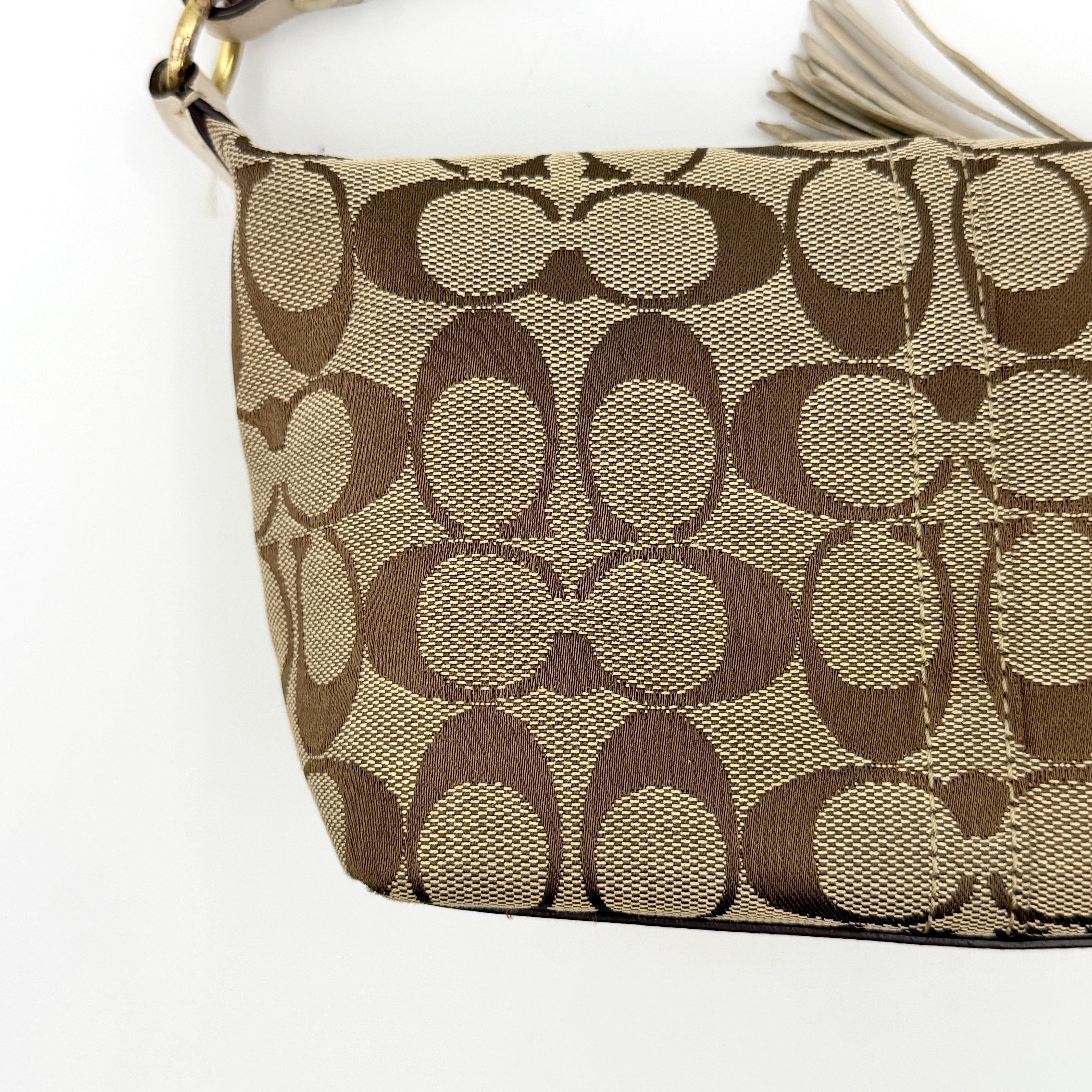 Coach Signature Stripe Mini Hobo Shoulder Bag in beige and gold with monogram canvas, cream leather trim, and gold stripes.