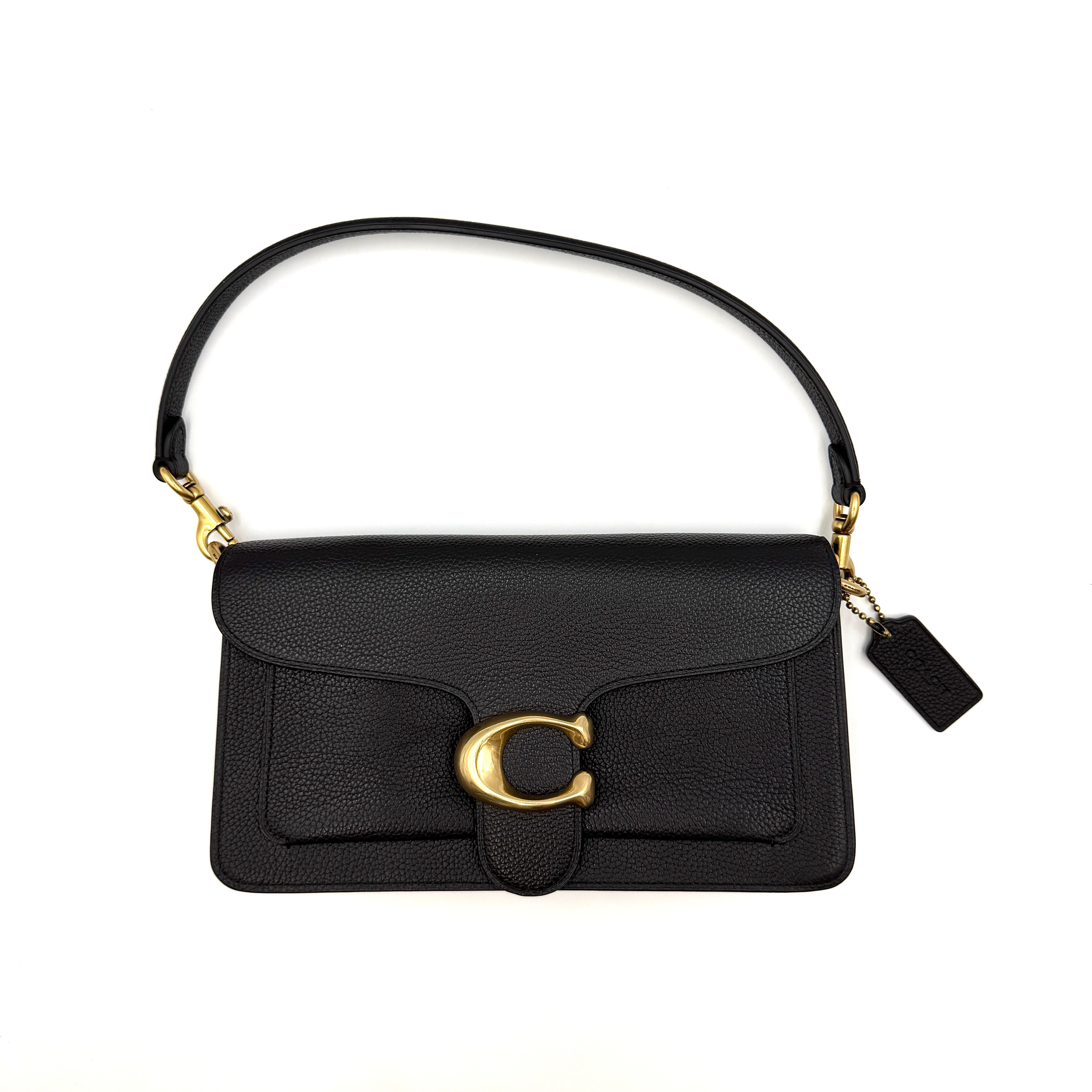 Coach Tabby 26 black shoulder bag with gold hardware and detachable straps, shown with dust bag and care card.