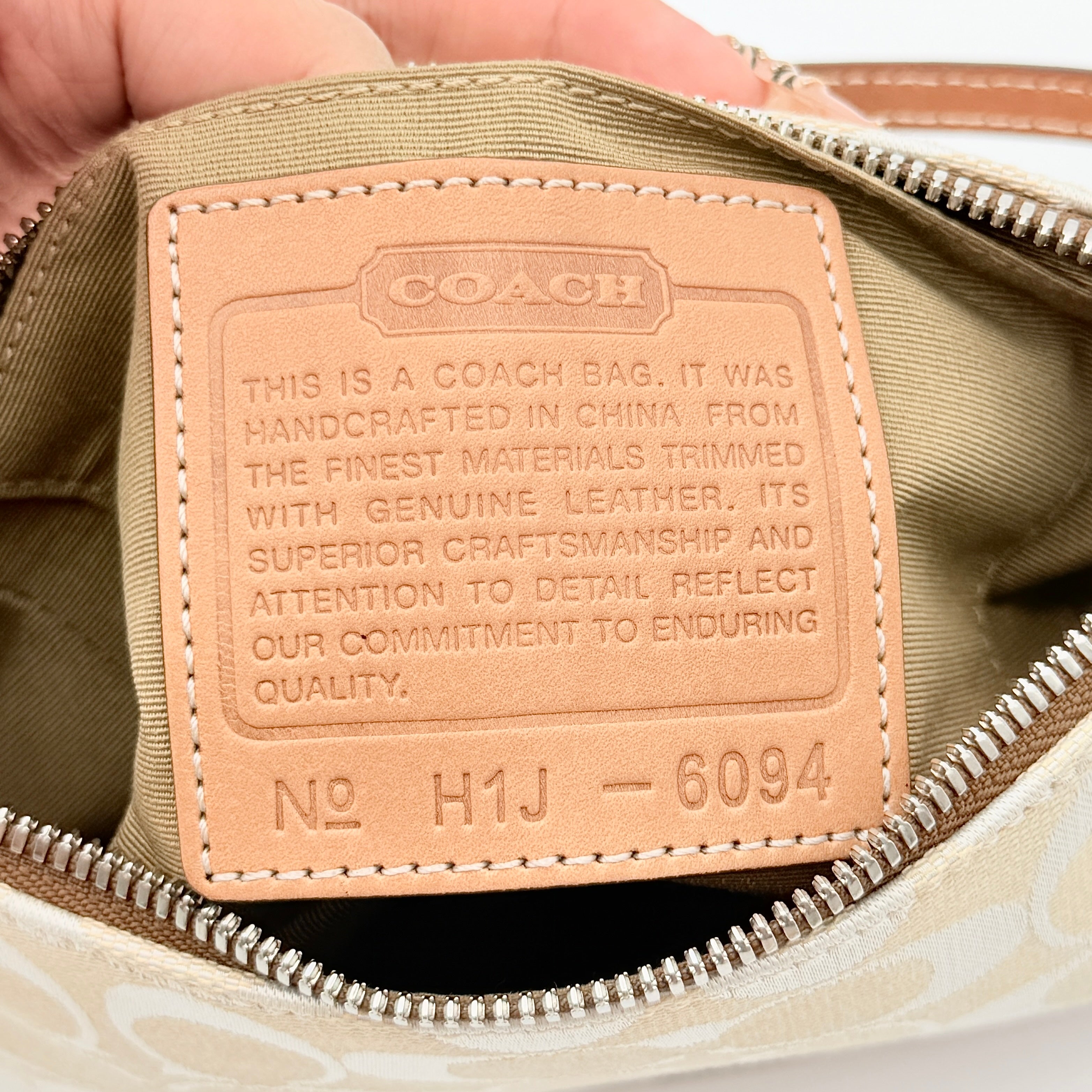 Coach Y2K Demi Shoulder Bag in cream and tan jacquard canvas with leather trim and signature tag.