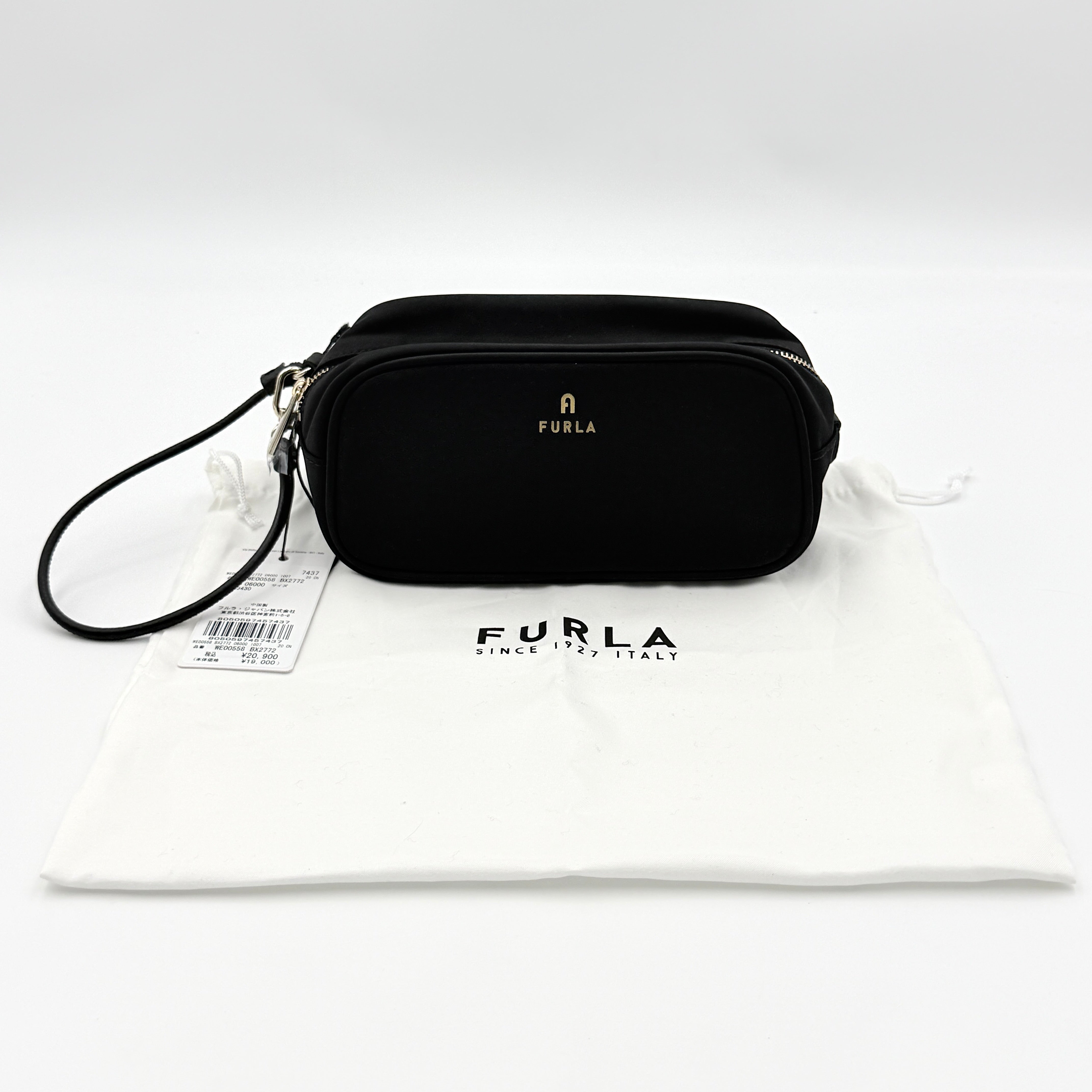 Furla Camelia Cosmetic Case in black nylon with gold logo and wristlet strap, shown with original tag.