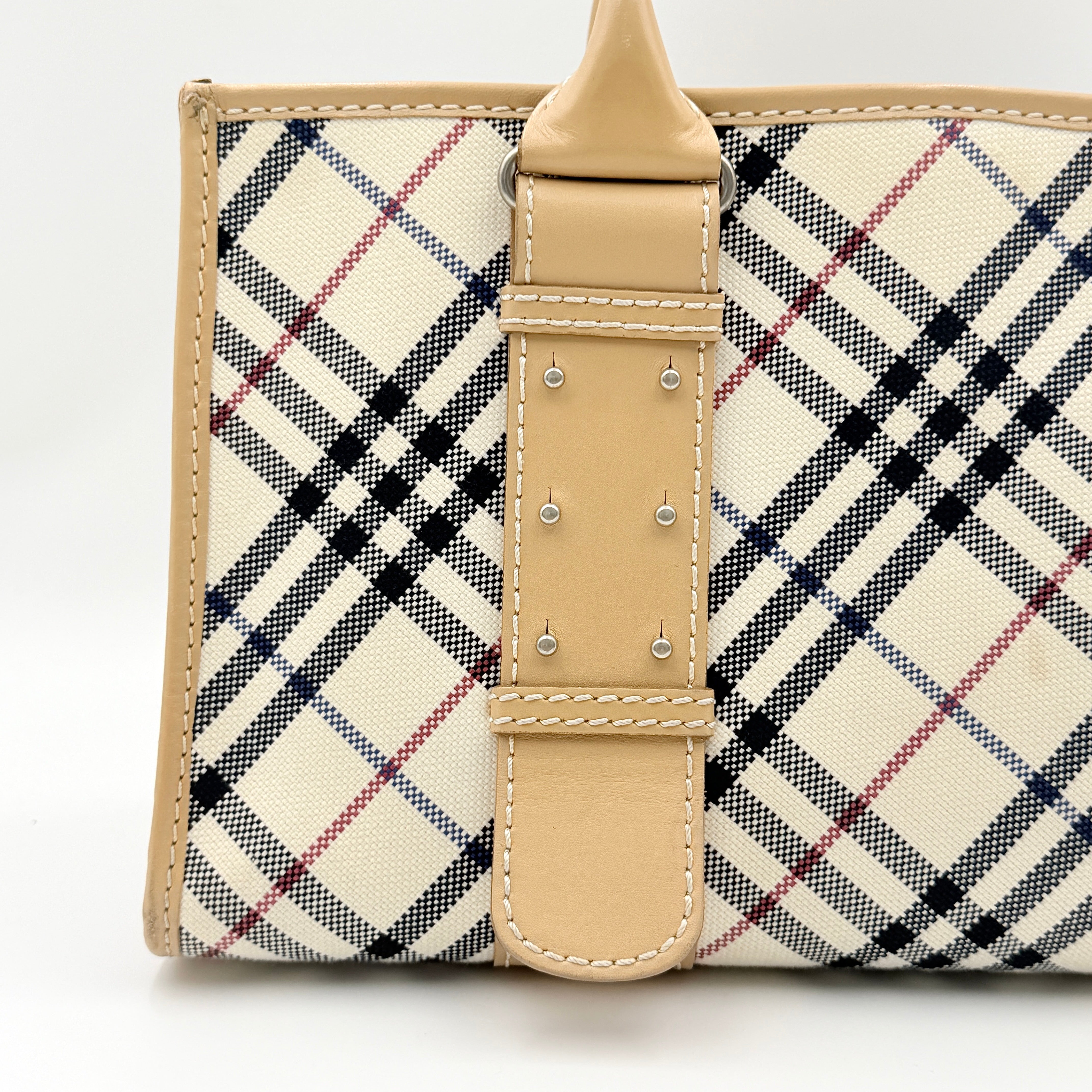 Burberry Blue Label Nova Check handbag in beige with leather trim and double top handles, displayed against a white background.