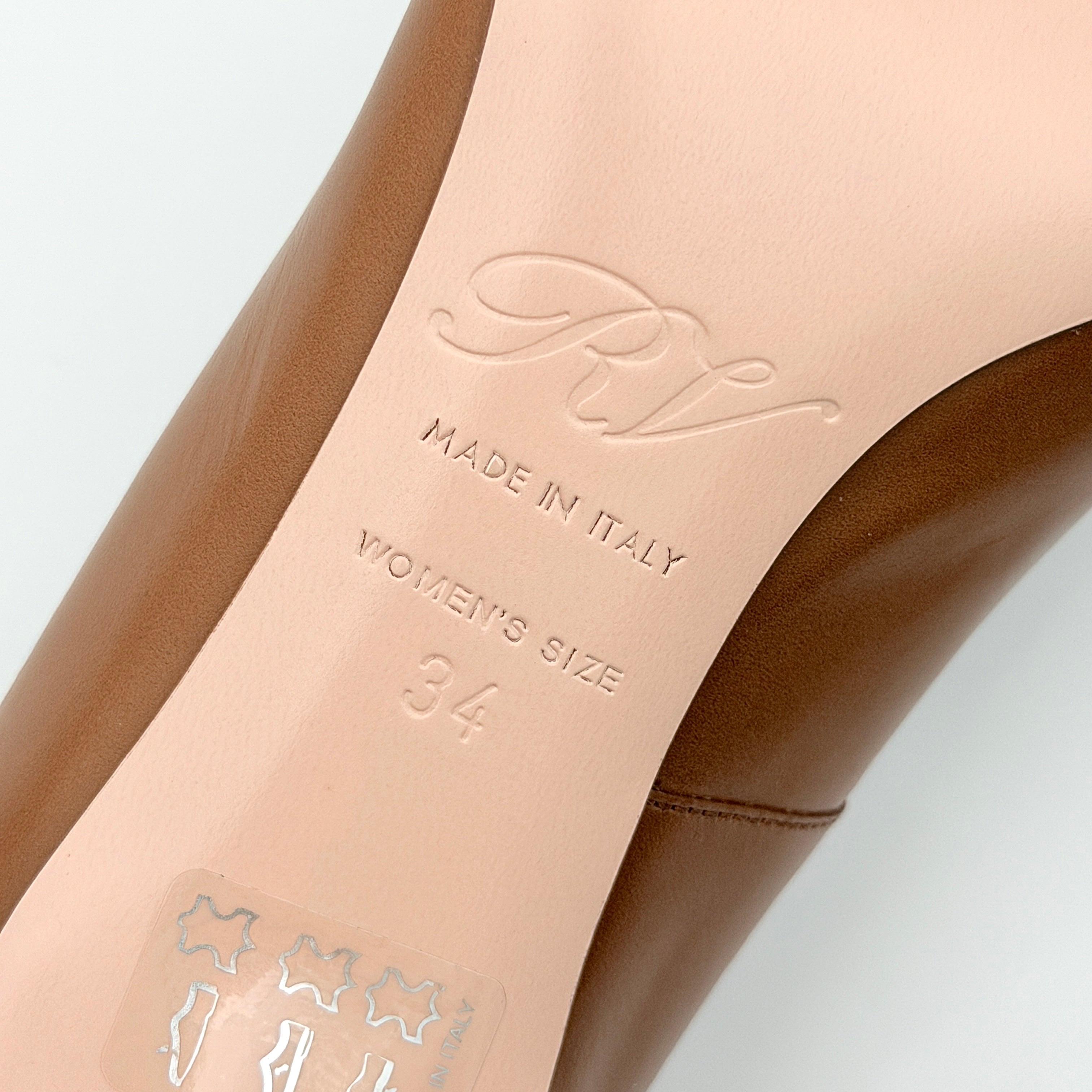 A pair of Roger Vivier Belle Vivier Trompette leather pumps in brown with gold-tone signature buckle and squared toe.