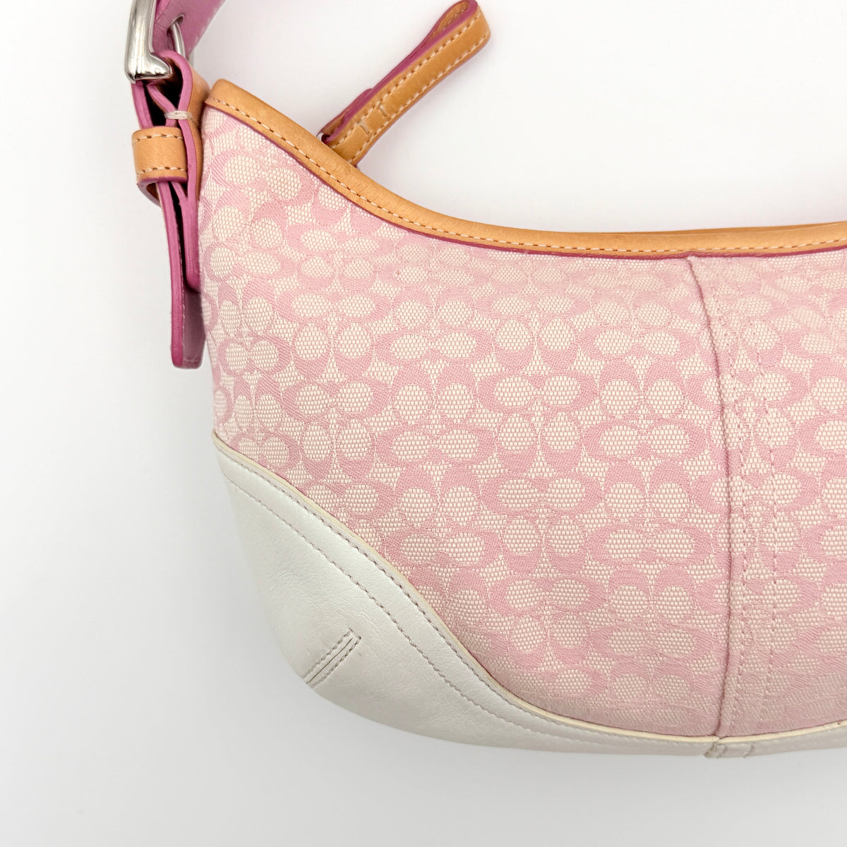 Coach Y2K Signature Hobo Shoulder Bag in pink jacquard with tan and white leather trim, shown on a white background.