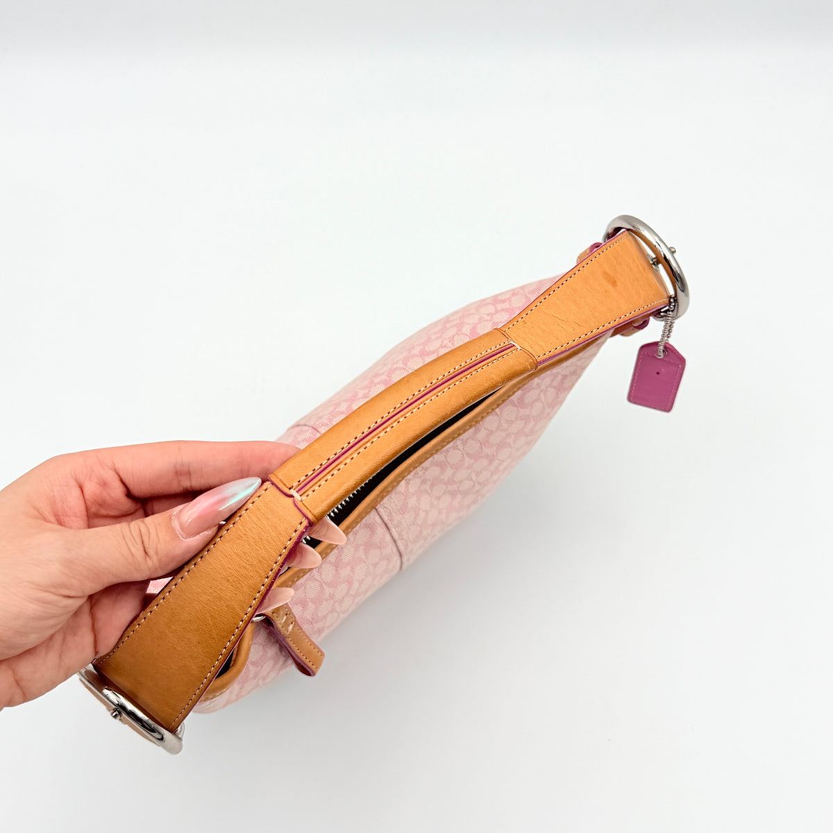 Coach Y2K Signature Hobo Shoulder Bag in pink jacquard with tan and white leather trim, shown on a white background.