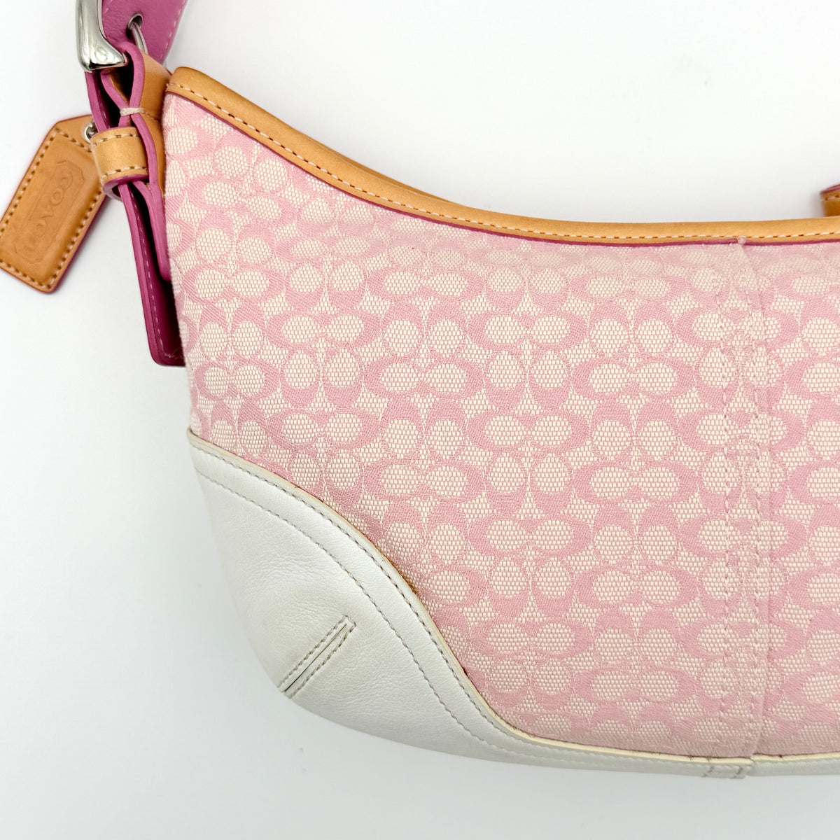 Coach Y2K Signature Hobo Shoulder Bag in pink jacquard with tan and white leather trim, shown on a white background.
