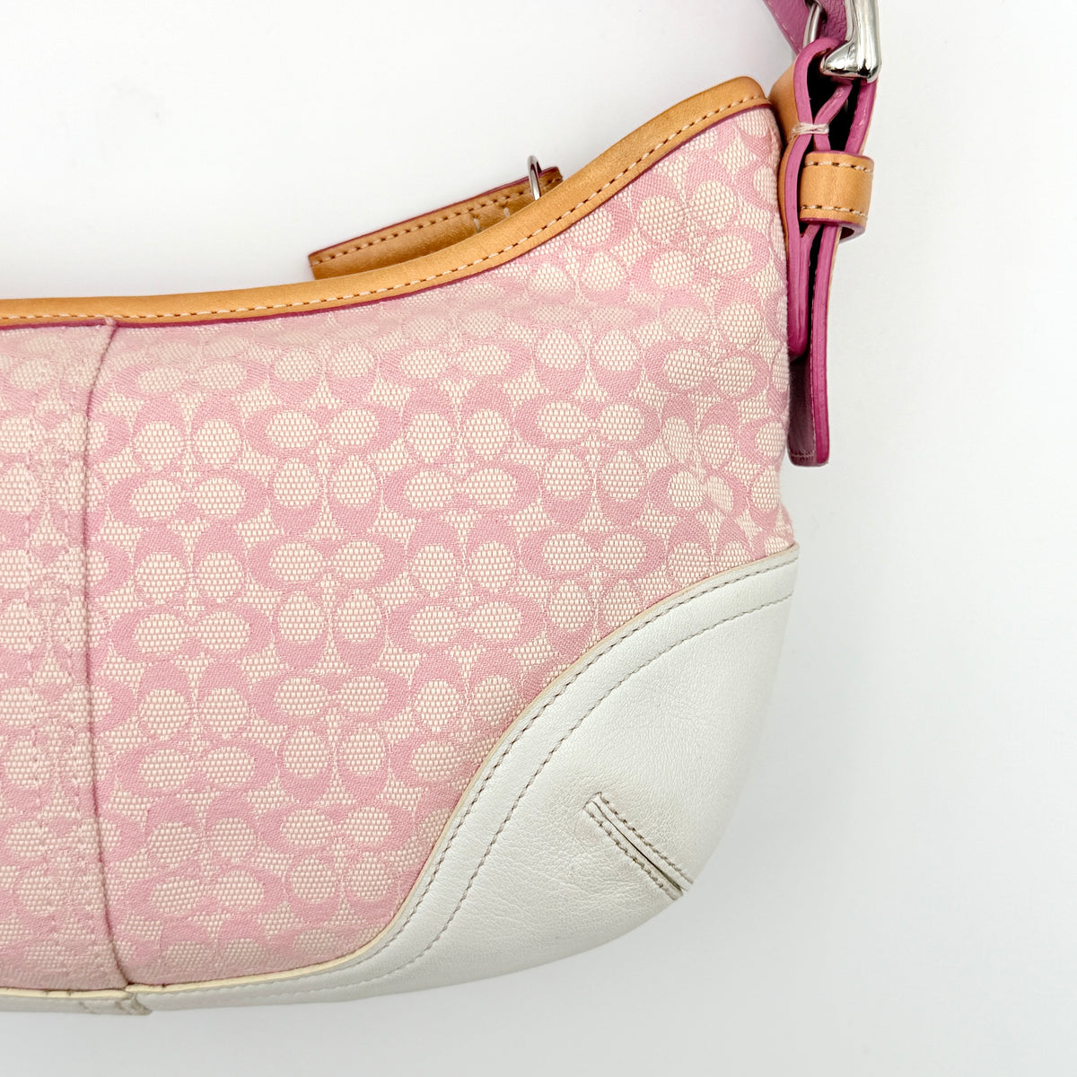 Coach Y2K Signature Hobo Shoulder Bag in pink jacquard with tan and white leather trim, shown on a white background.