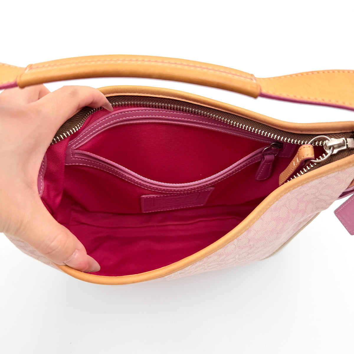 Coach Y2K Signature Hobo Shoulder Bag in pink jacquard with tan and white leather trim, shown on a white background.