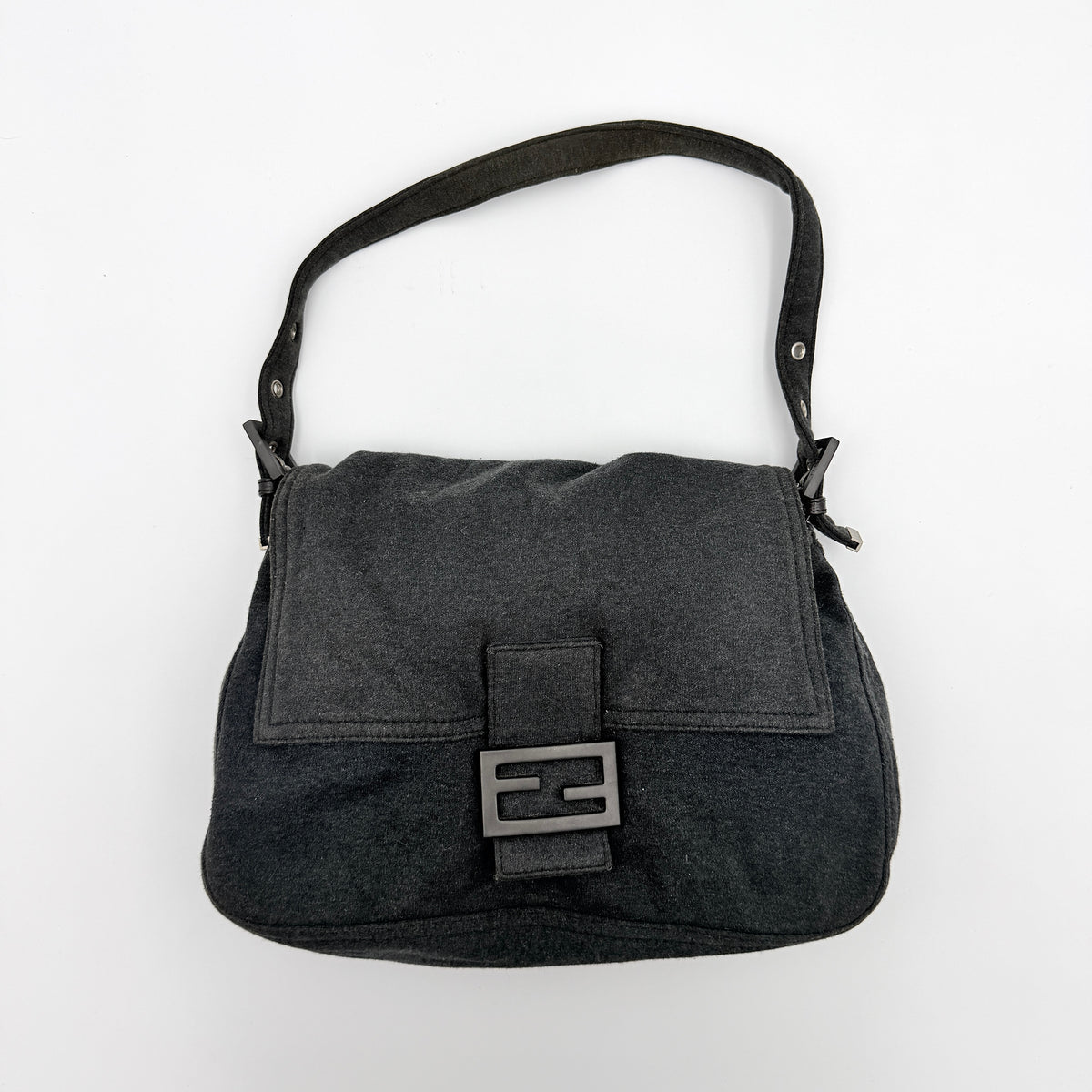 Fendi Mamma Baguette in grey textile with matte FF plaque, shown with original yellow Fendi dust bag.