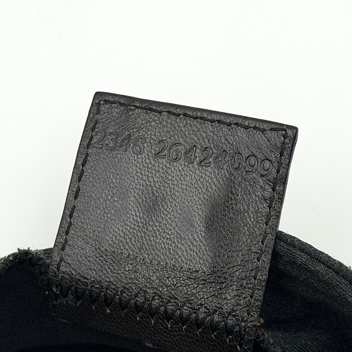 Fendi Mamma Baguette in grey textile with matte FF plaque, shown with original yellow Fendi dust bag.
